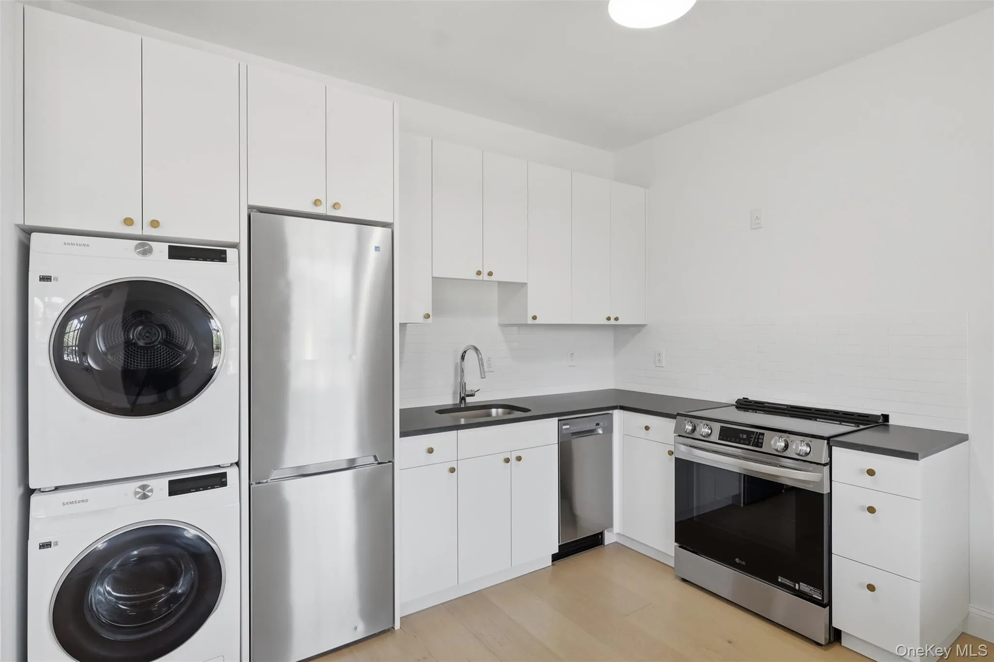 Kitchen with brand new appliances and private laundry Kitchen with brand new appliances and private laundry