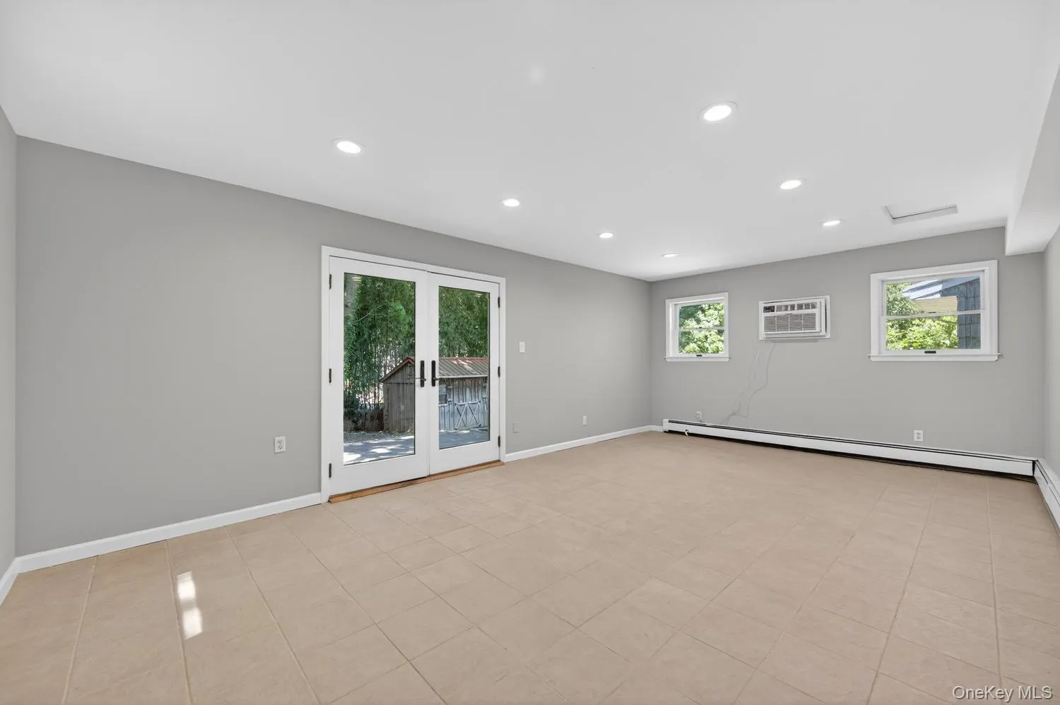 Family Room w/French Doors To Rear Patio & Private Yard. Family Room w/French Doors To Rear Patio & Private Yard.