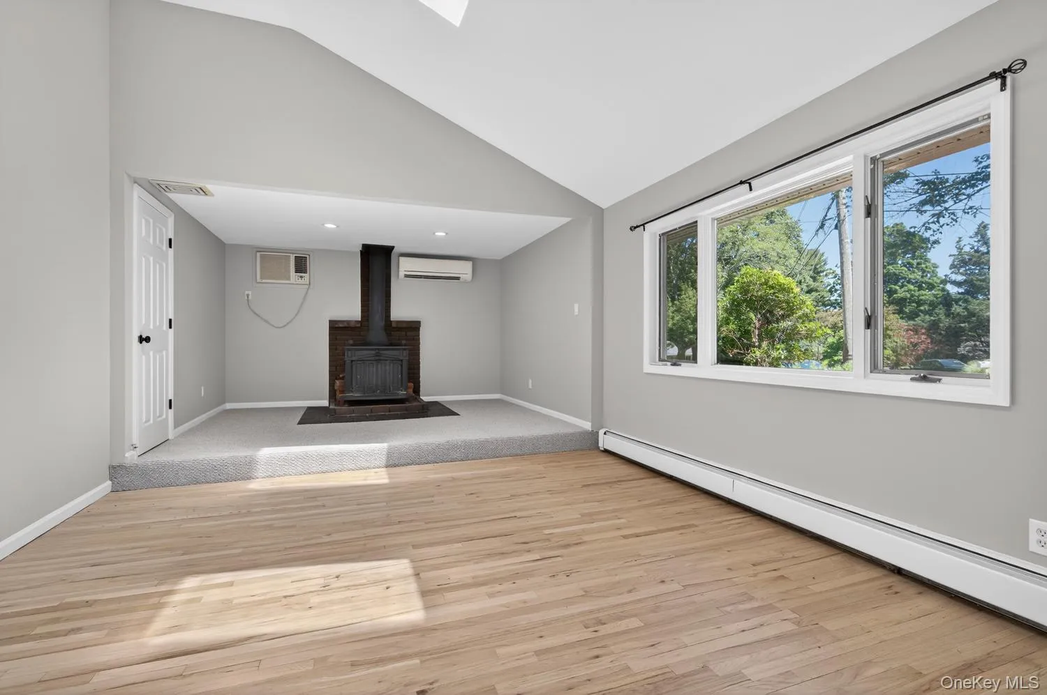 Beautiful Wood Floors & Cozy Wood Burning Stove Beautiful Wood Floors & Cozy Wood Burning Stove