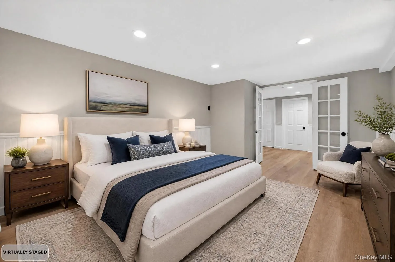 King Sized Private Primary Bedroom Is Located On The Lower Level. Virtually Staged. King Sized Private Primary Bedroom Is Located On The Lower Level. Virtually Staged.