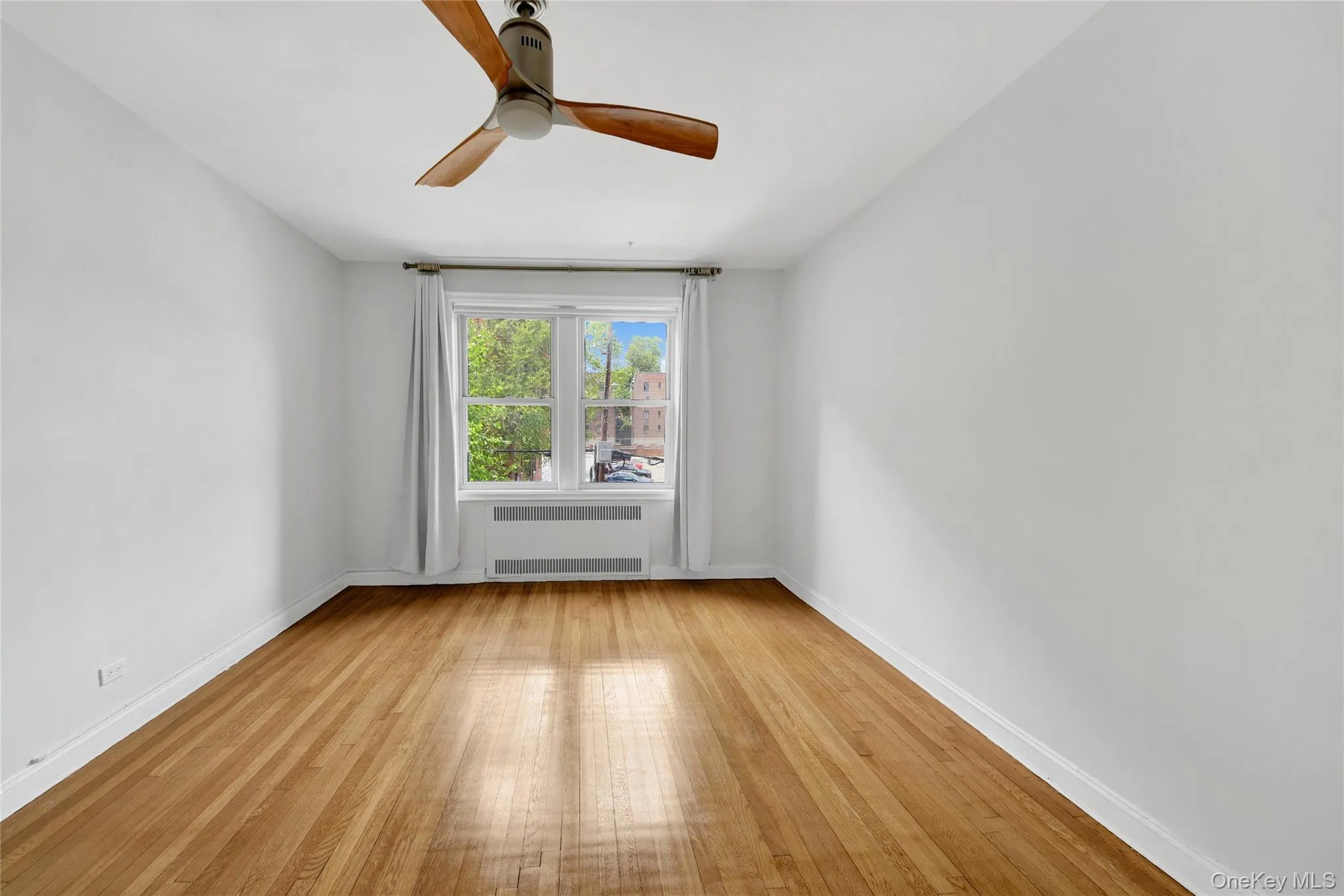 Second bedroom with out staging. Second bedroom with out staging.