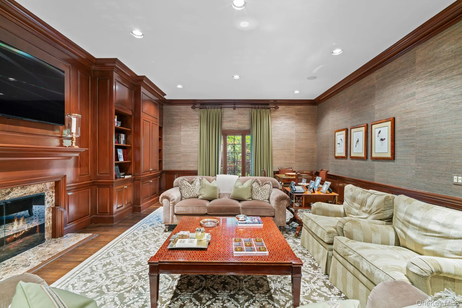 Designed with crown molding, wainscoted walls Designed with crown molding, wainscoted walls