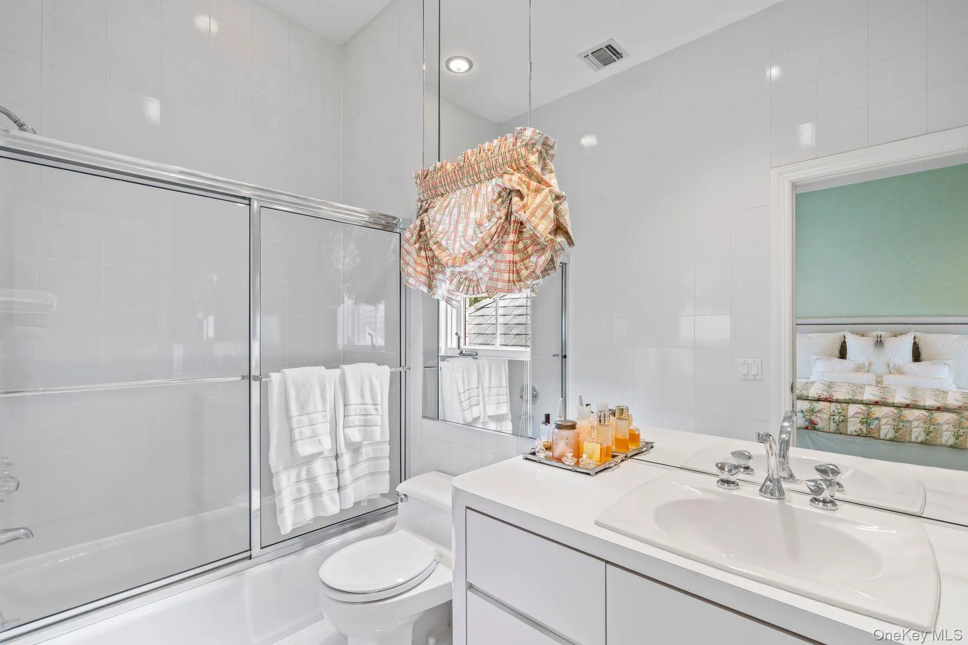 Bathroom with enclosed tub / shower combo, vanity, ensuite bath Bathroom with enclosed tub / shower combo, vanity, ensuite bath