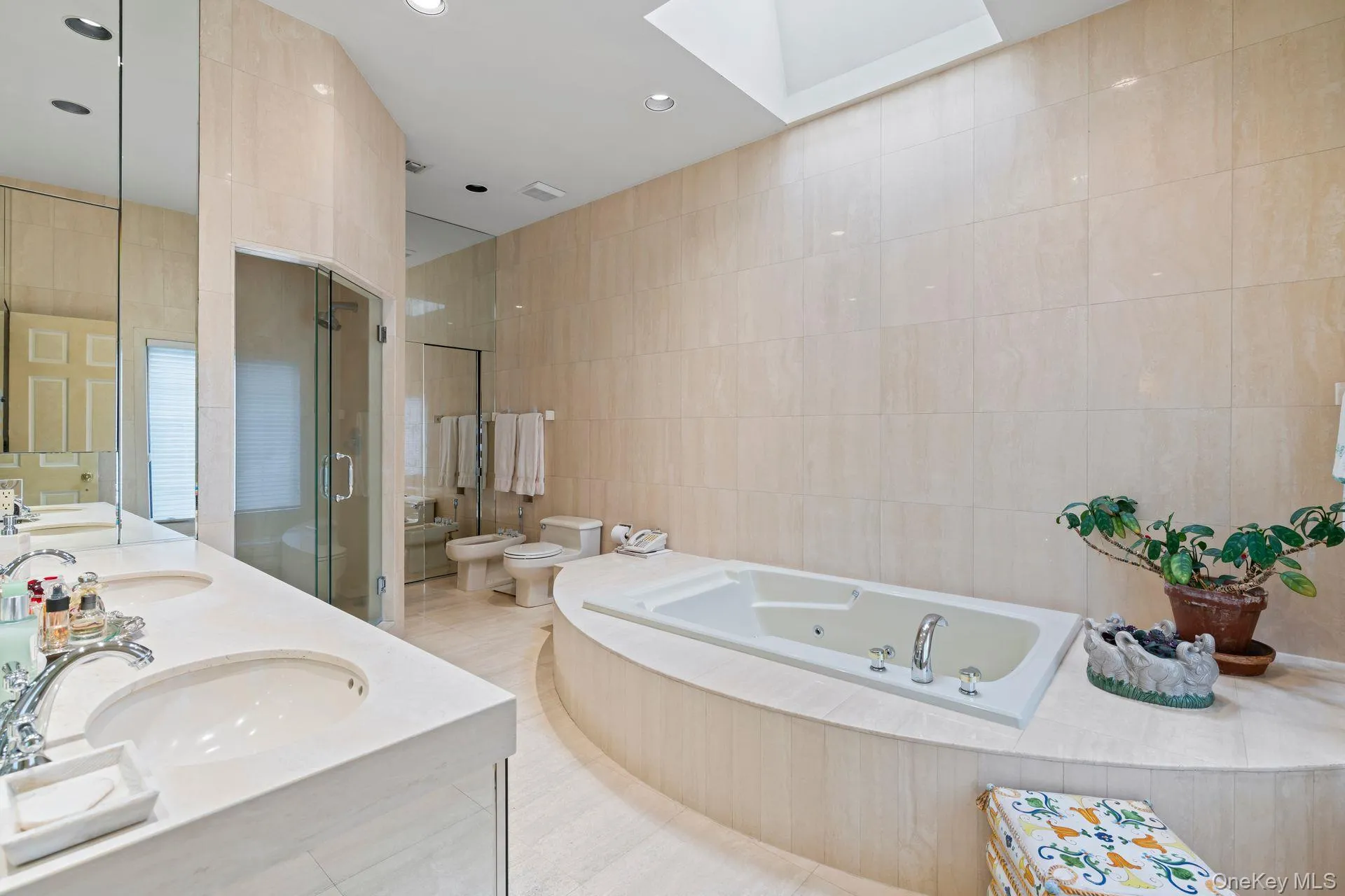 Lavish Marble bath with 2 undermount sinks, walk in shower and soaking tub Lavish Marble bath with 2 undermount sinks, walk in shower and soaking tub