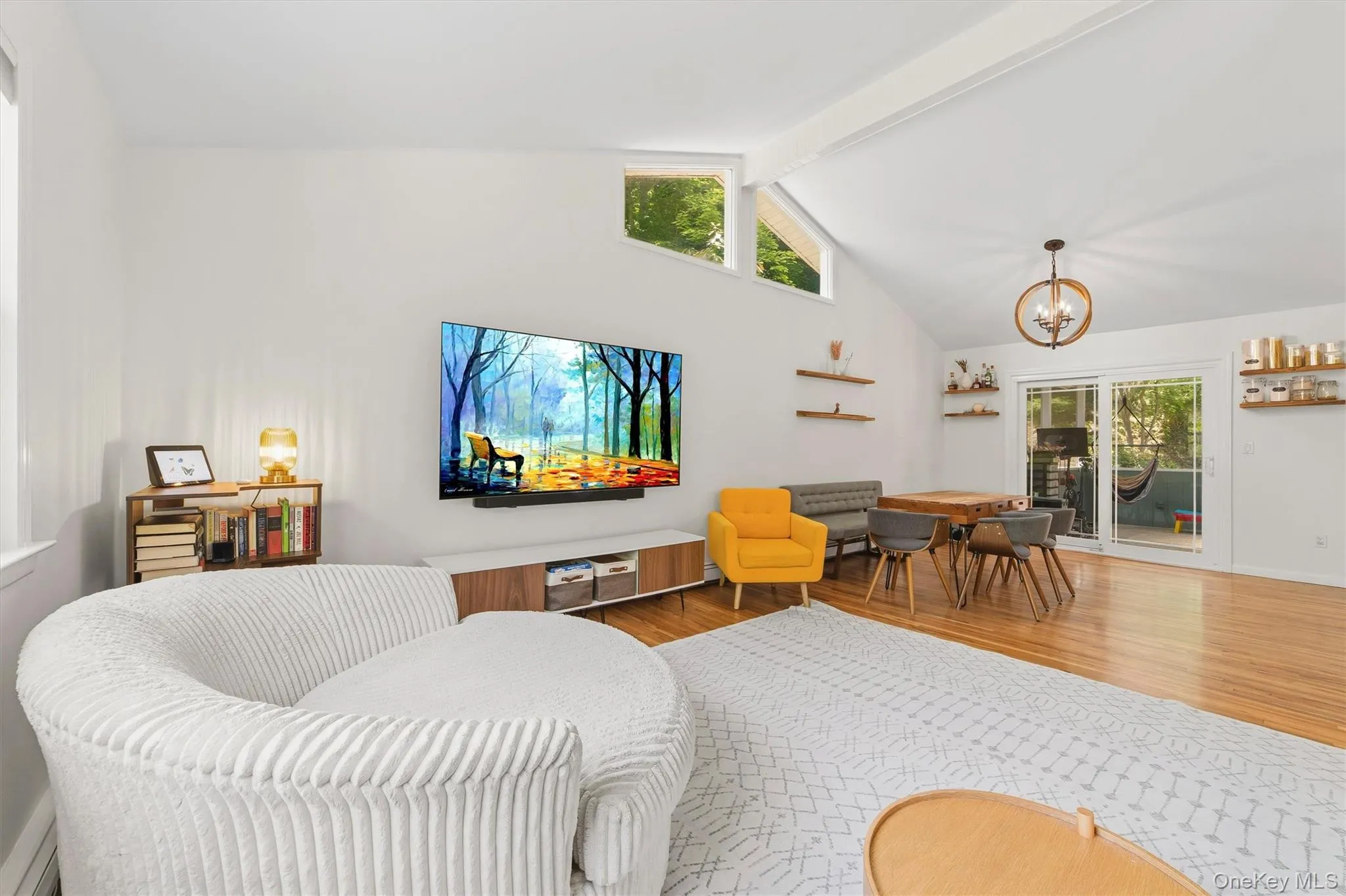 Vaulted ceilings with large windows with amazing natural light fill this home Vaulted ceilings with large windows with amazing natural light fill this home