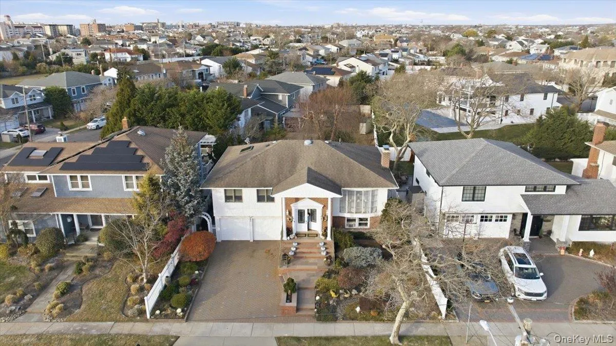 Aerial overview of property's location with nearby suburban area Aerial overview of property's location with nearby suburban area