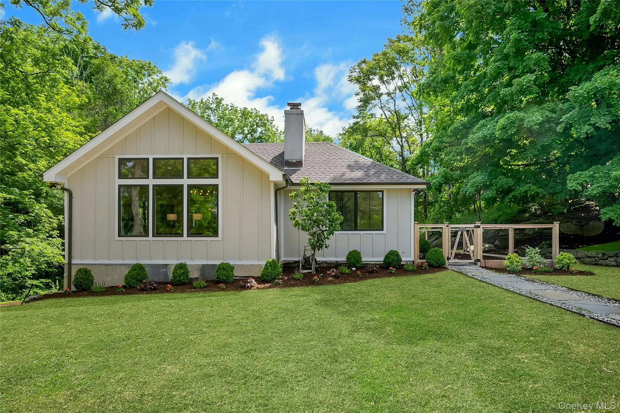 Grass color is virtually staged. Lawn was just seeded and not fully grown in. Grass color is virtually staged. Lawn was just seeded and not fully grown in.