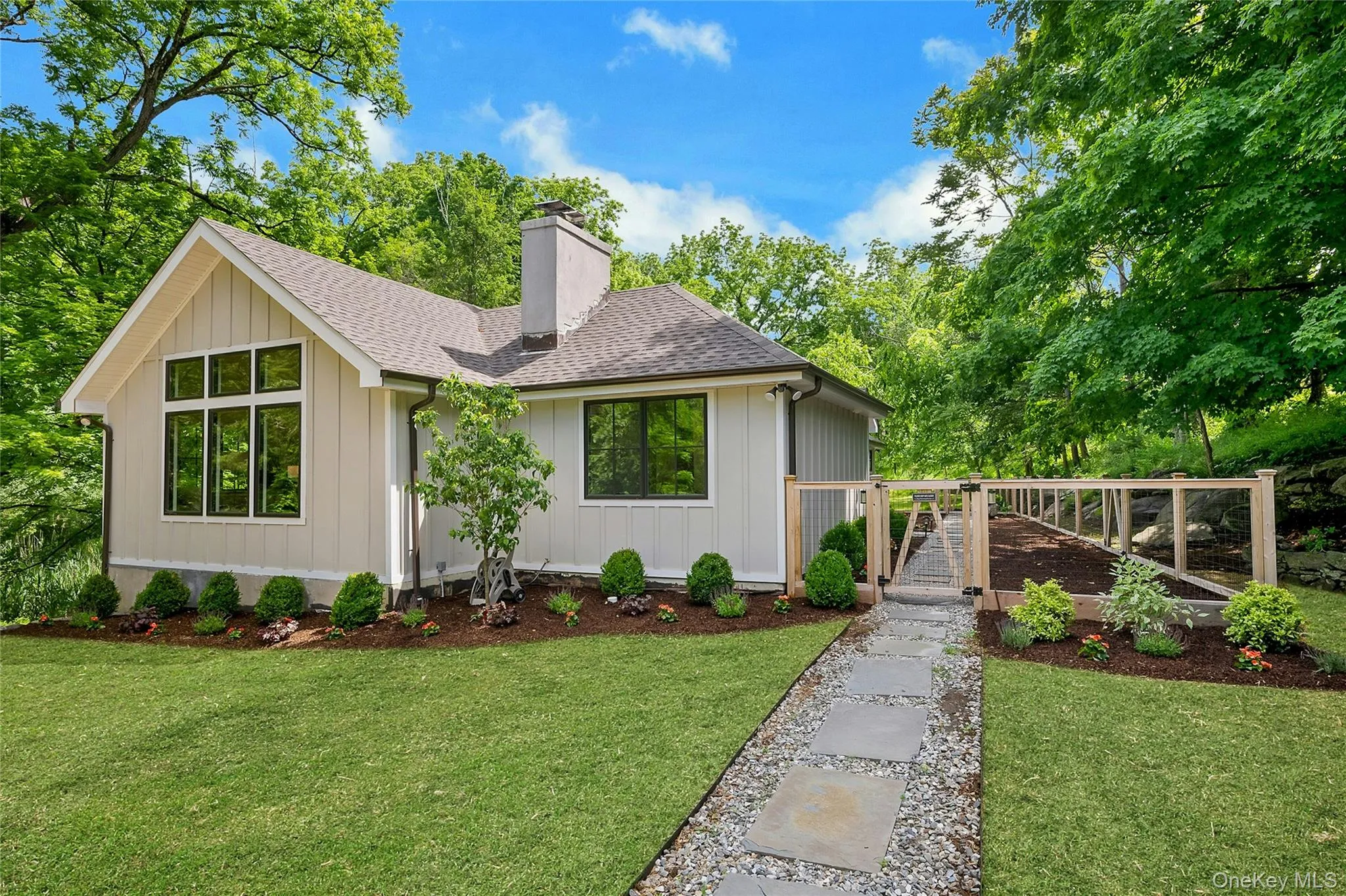 Grass color is virtually staged. Lawn was just seeded and not fully grown in. Grass color is virtually staged. Lawn was just seeded and not fully grown in.