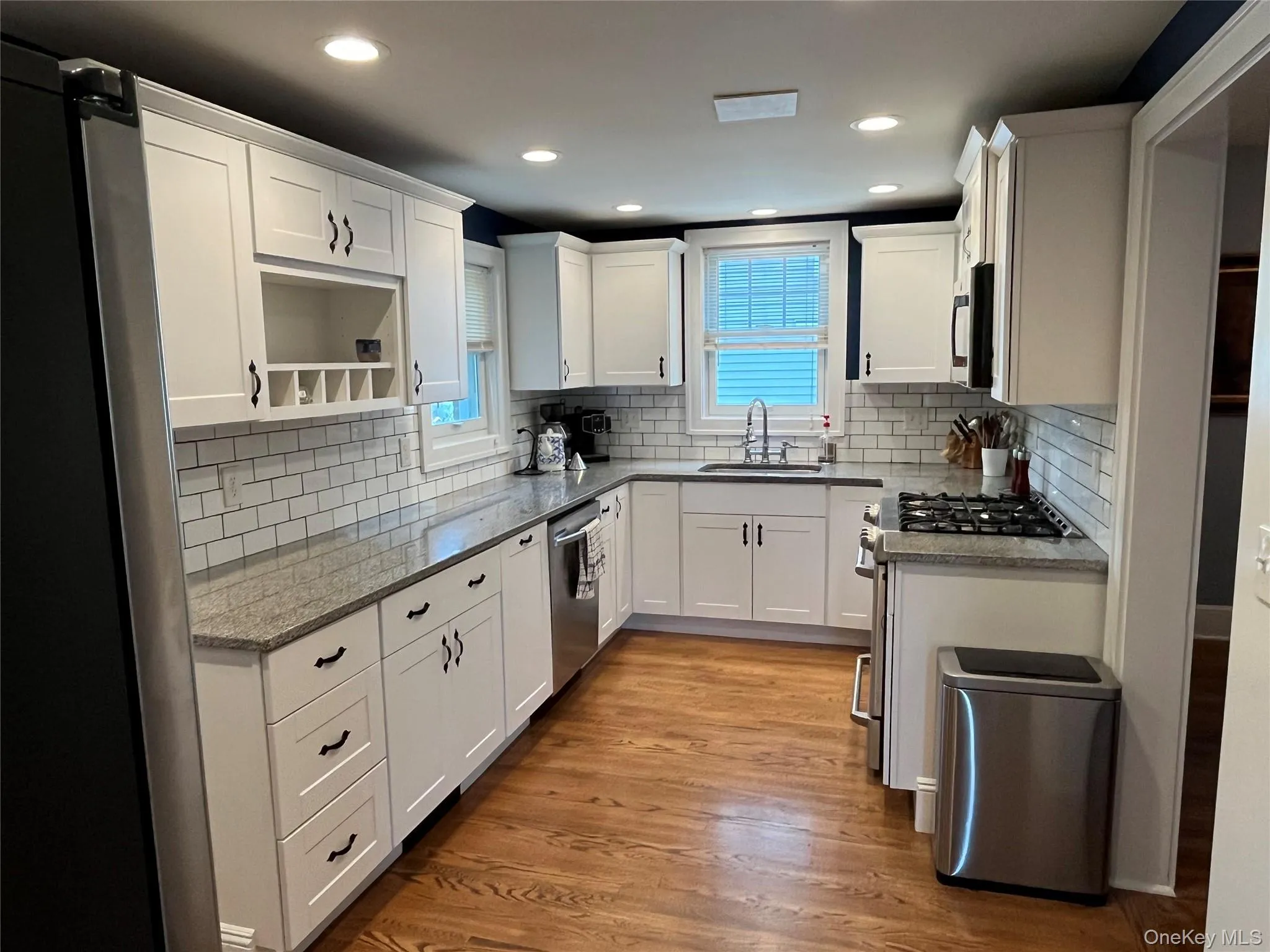 Kitchen with Stainless Steel Appliance, Crown Molding , and Granite Counters Kitchen with Stainless Steel Appliance, Crown Molding , and Granite Counters