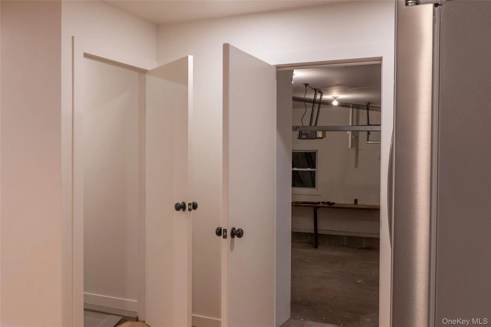 Doors leading to garage and into basement Doors leading to garage and into basement