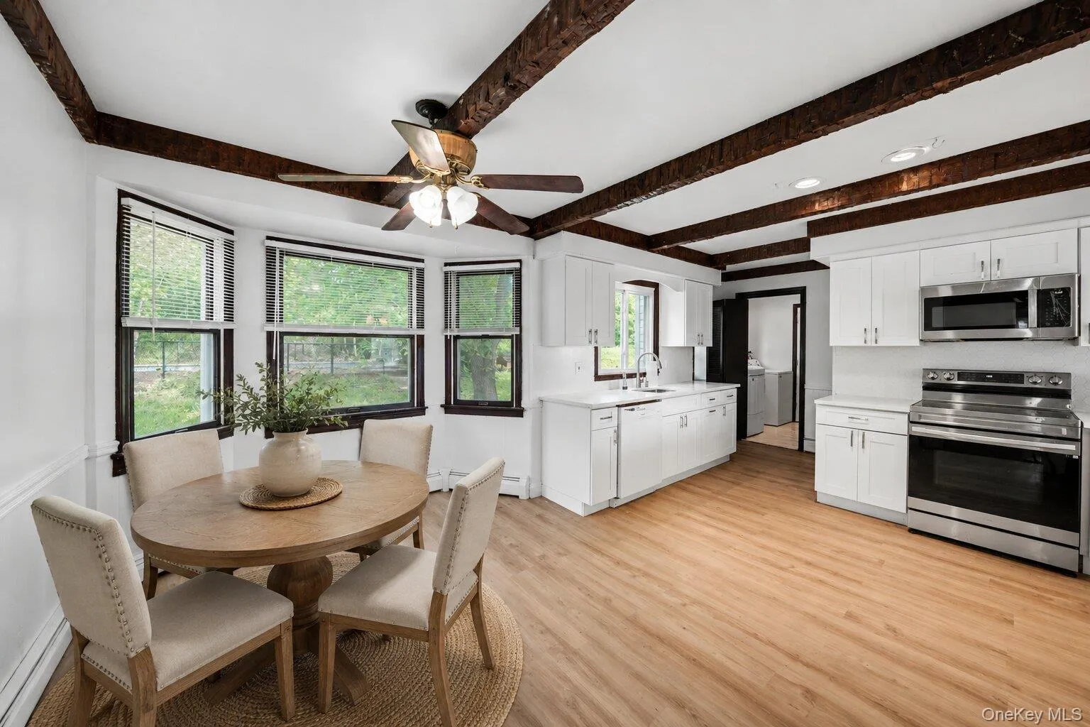 Virtually Staged. Functional kitchen with plenty of workspace and cabinetry, offering a convenient layout for cooking, meal prep, and daily use. Virtually Staged. Functional kitchen with plenty of workspace and cabinetry, offering a convenient layout for cooking, meal prep, and daily use.