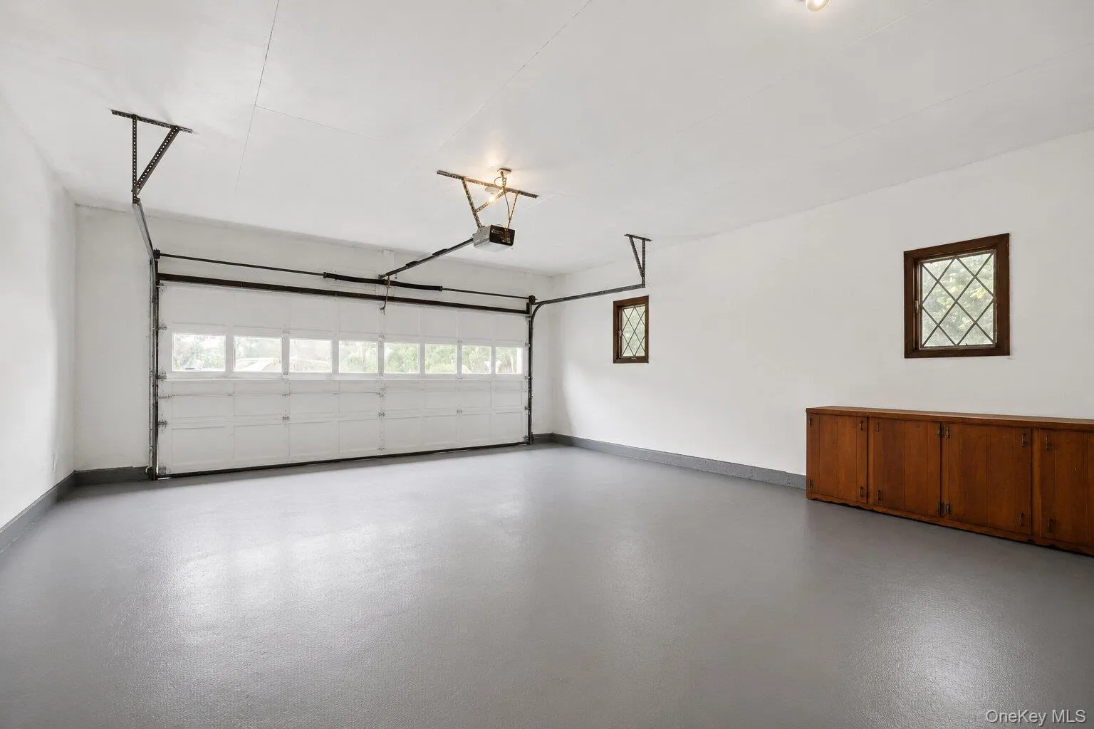 Attached garage providing secure parking, storage space, and everyday convenience. Attached garage providing secure parking, storage space, and everyday convenience.