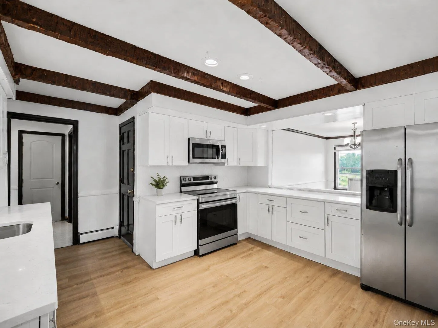 Functional kitchen with plenty of workspace and cabinetry, offering a convenient layout for cooking, meal prep, and daily use. Functional kitchen with plenty of workspace and cabinetry, offering a convenient layout for cooking, meal prep, and daily use.