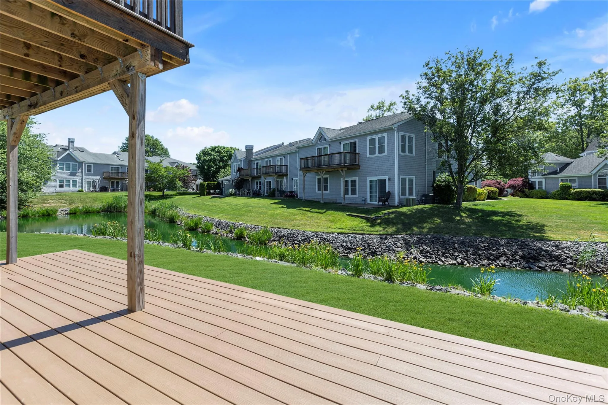 Expansive composite decking providing outdoor living space Expansive composite decking providing outdoor living space