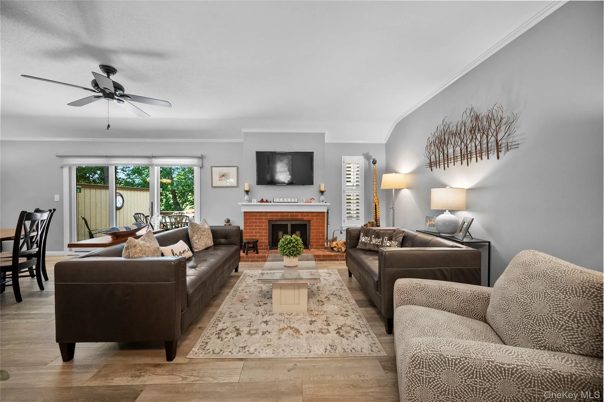 Living area featuring ceramic floors and light gray wall paint Living area featuring ceramic floors and light gray wall paint