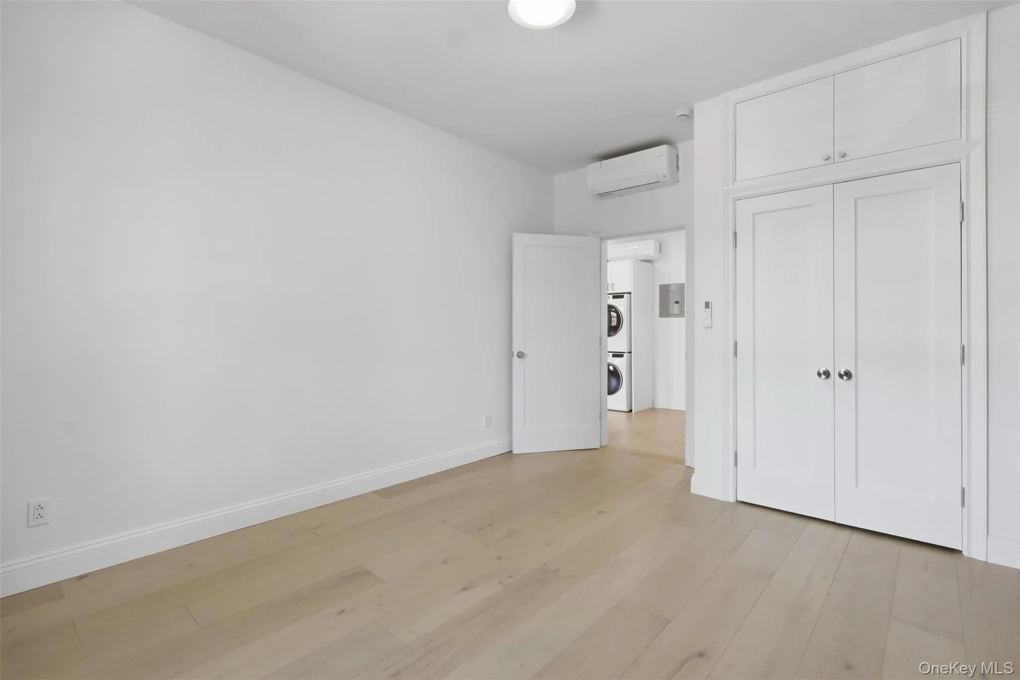 Bedroom with Exposed Brick, Large Closet + Mini-Split Bedroom with Exposed Brick, Large Closet + Mini-Split