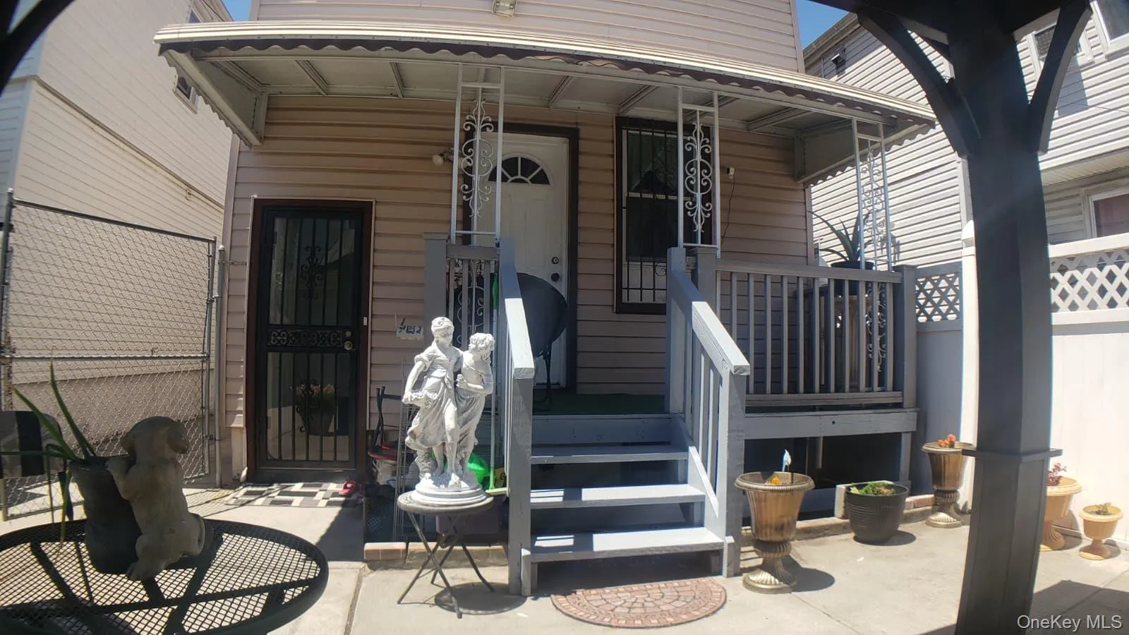 Basement outside entrance & back patio. Basement outside entrance & back patio.