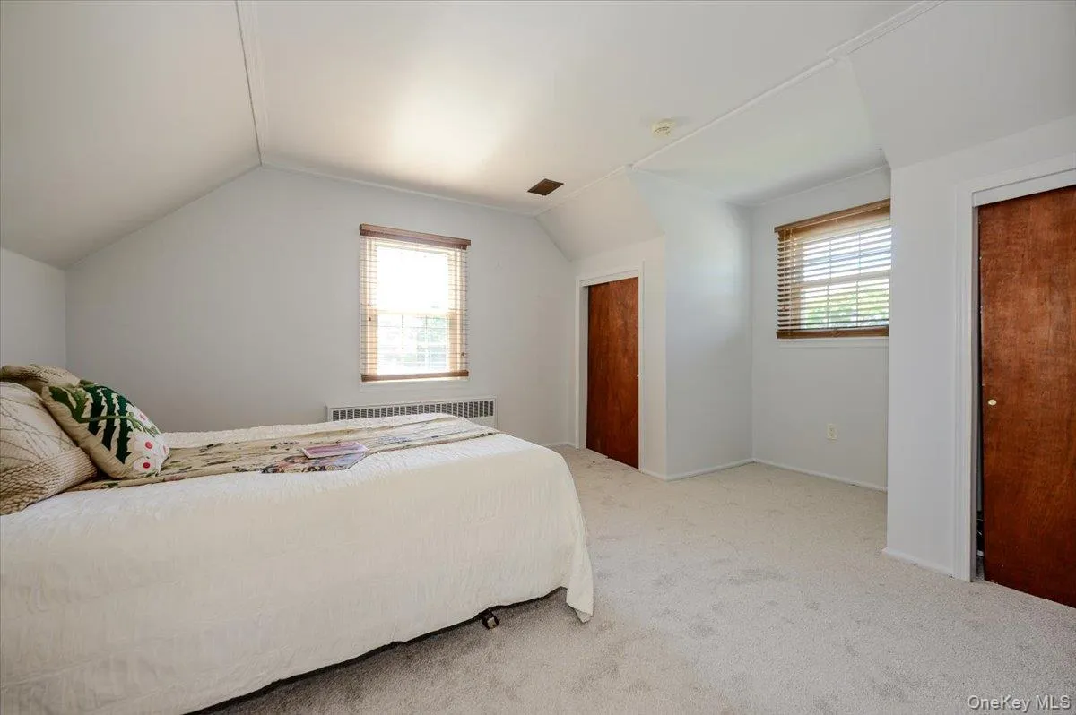 Third bedroom located on second level with wall to wall carpeting and lots of windows and storage. Third bedroom located on second level with wall to wall carpeting and lots of windows and storage.