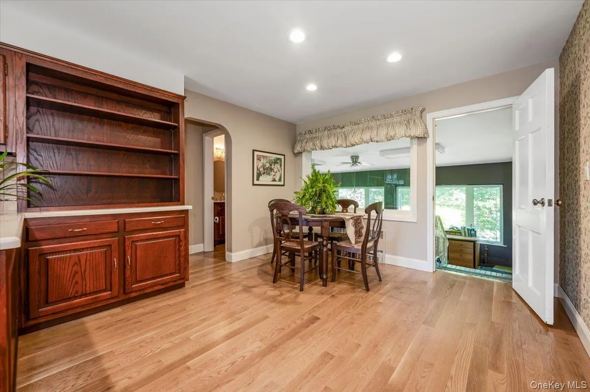 Eating area in the kitchen with built in buffet and storage. Eating area in the kitchen with built in buffet and storage.