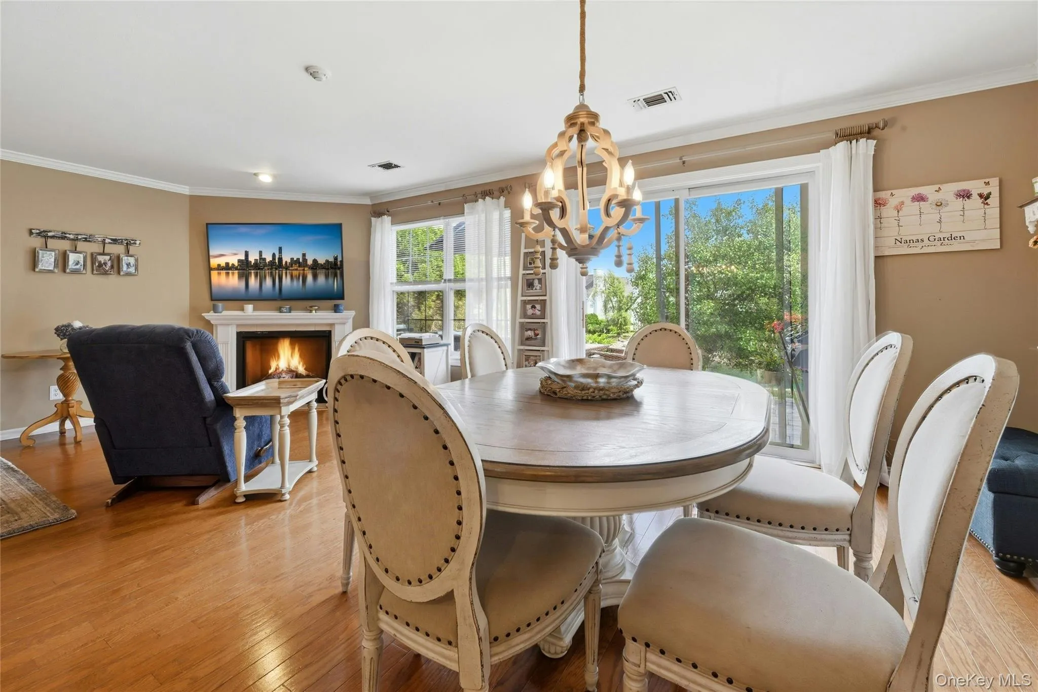 Wood Flooring, Crown Molding, Sliders With a Picturesque View of Lake Wood Flooring, Crown Molding, Sliders With a Picturesque View of Lake