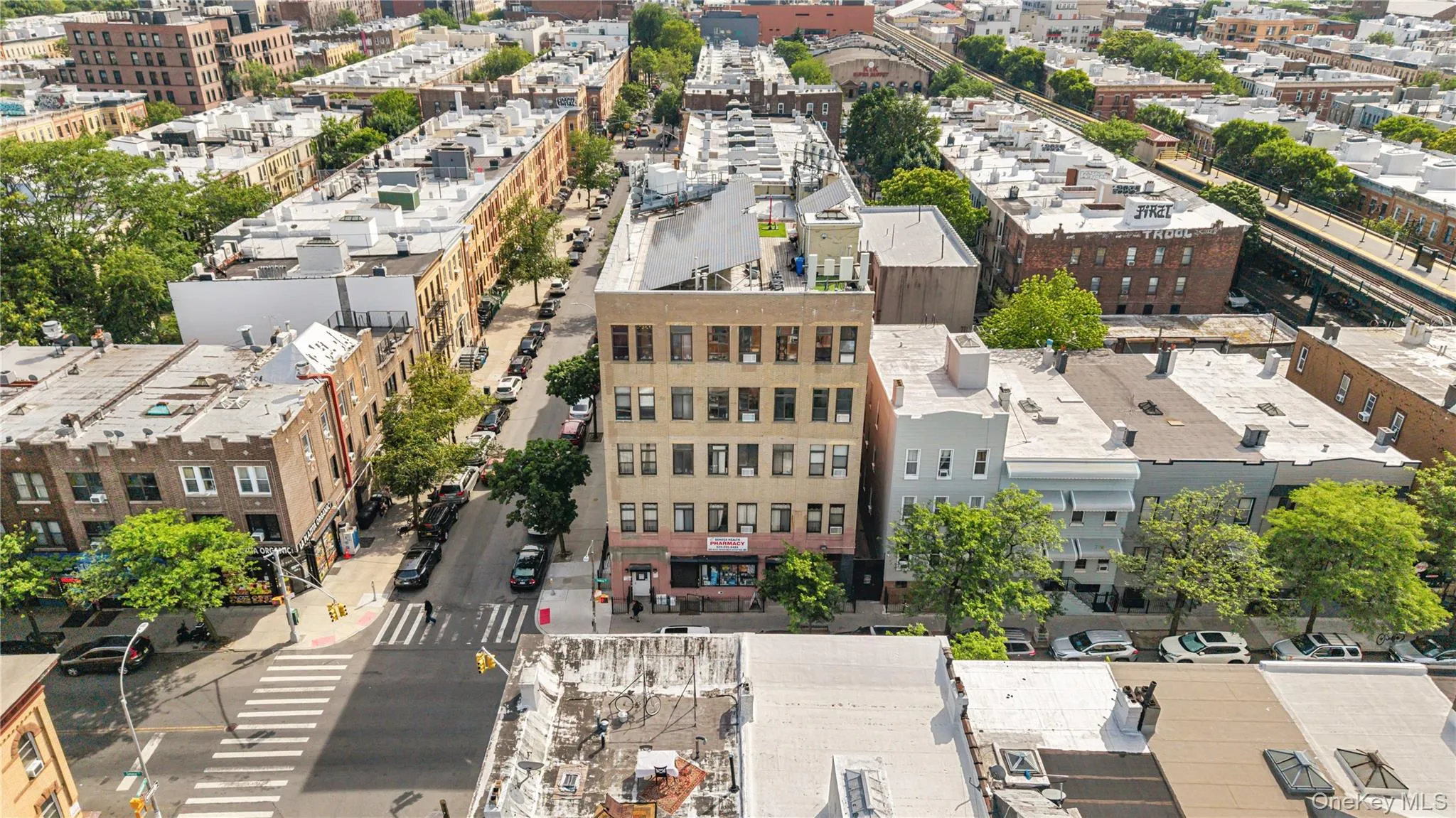 Multi-story commercial building featuring ground-level retail space and upper-level units Multi-story commercial building featuring ground-level retail space and upper-level units