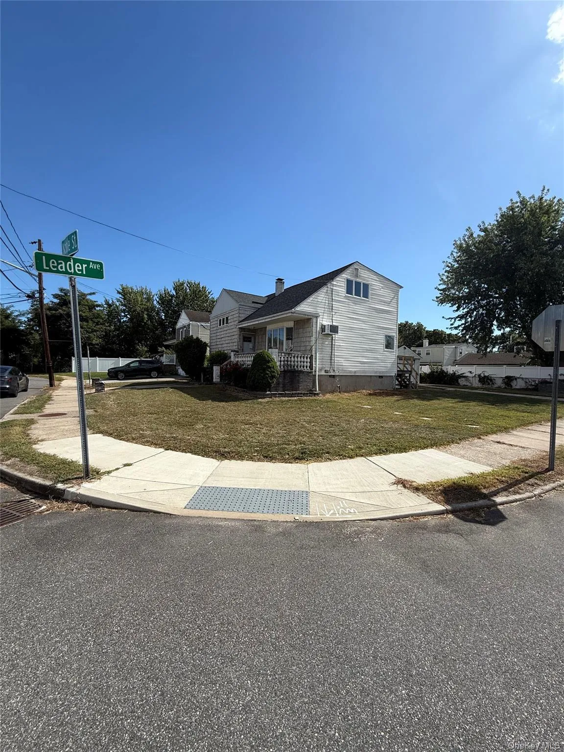 View of corner of house with a front lawn View of corner of house with a front lawn
