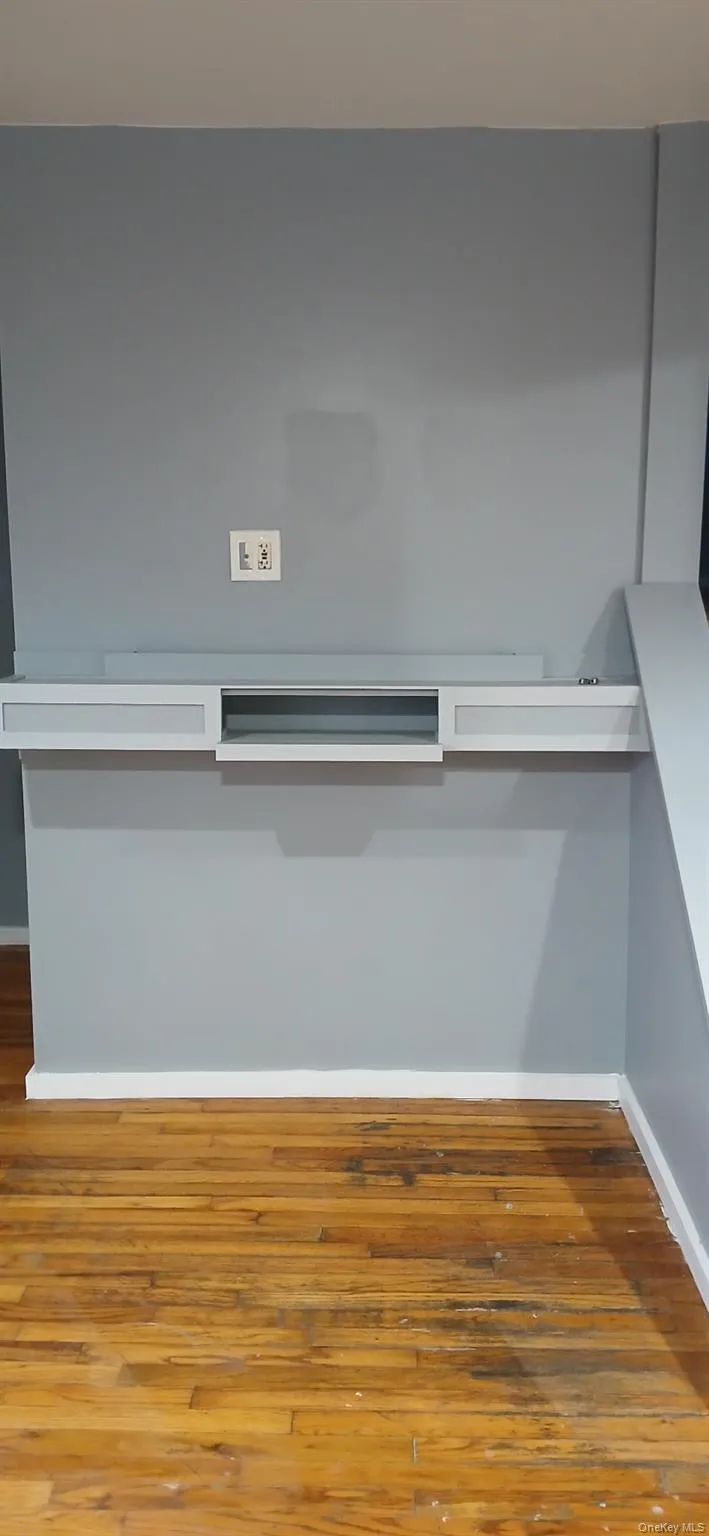 Detailed view of wood finished floors and baseboards Detailed view of wood finished floors and baseboards
