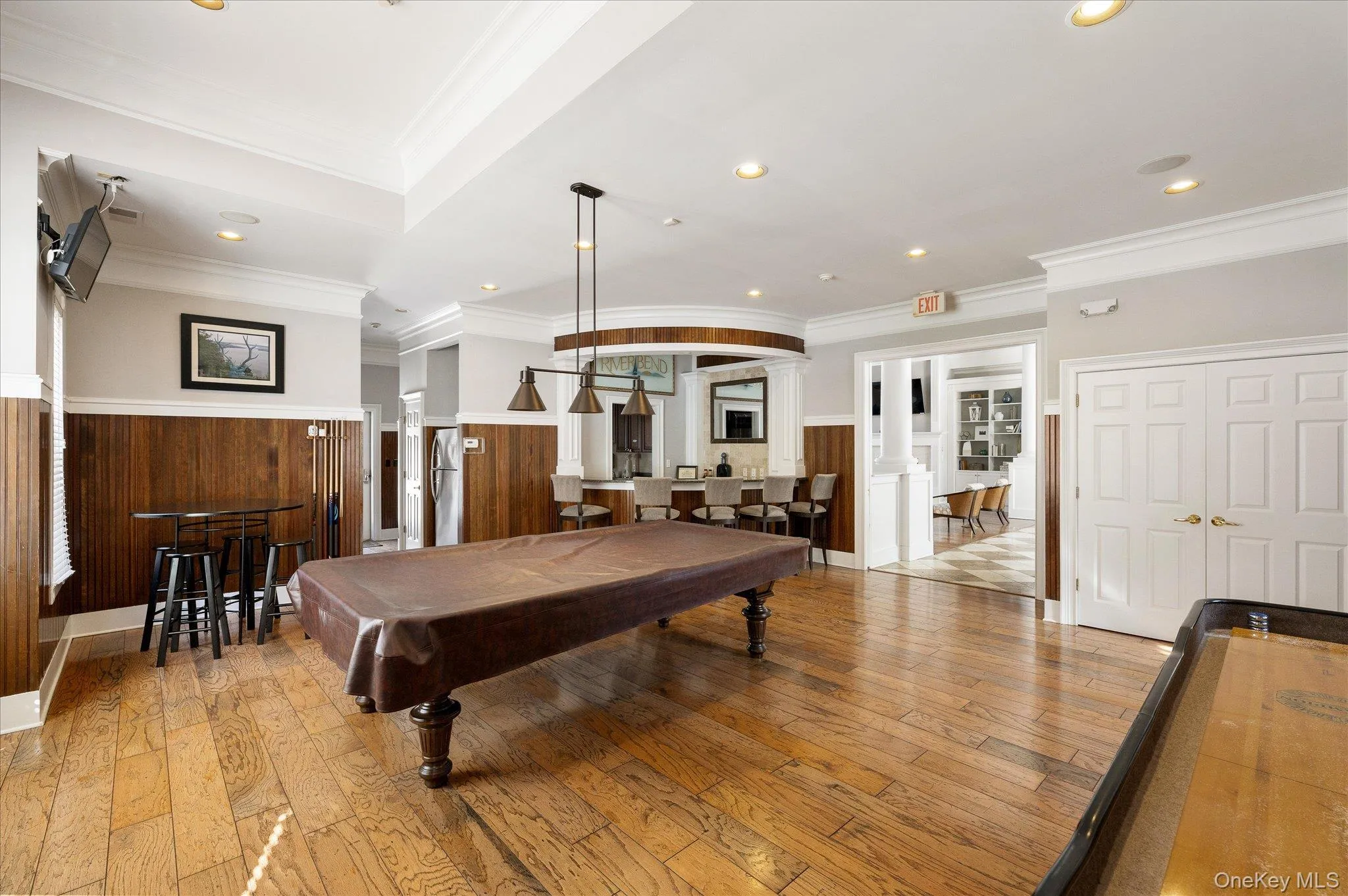 Billiards room in clubhouse with bar and kitchen Billiards room in clubhouse with bar and kitchen