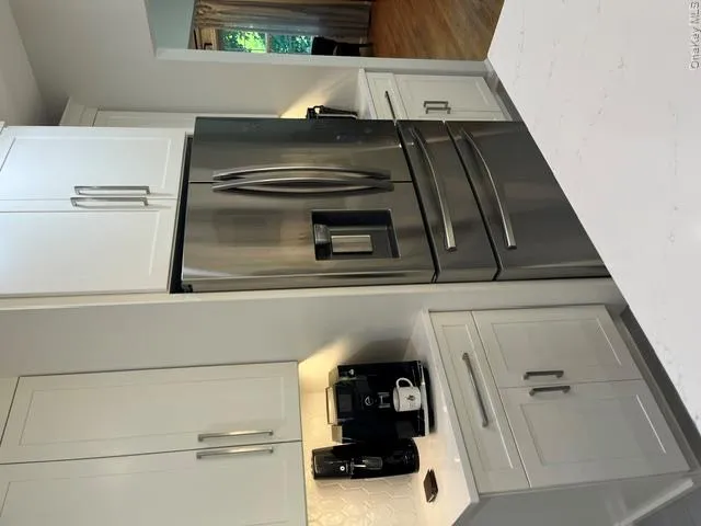One of two refrigerators One of two refrigerators