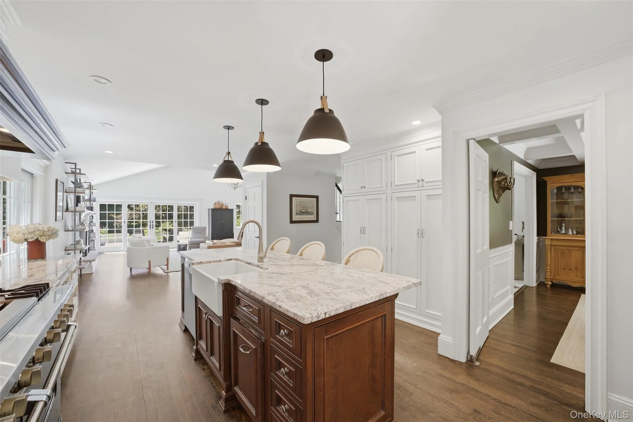 Open kitchen into great room and dining room inviting easy entertaining and living Open kitchen into great room and dining room inviting easy entertaining and living