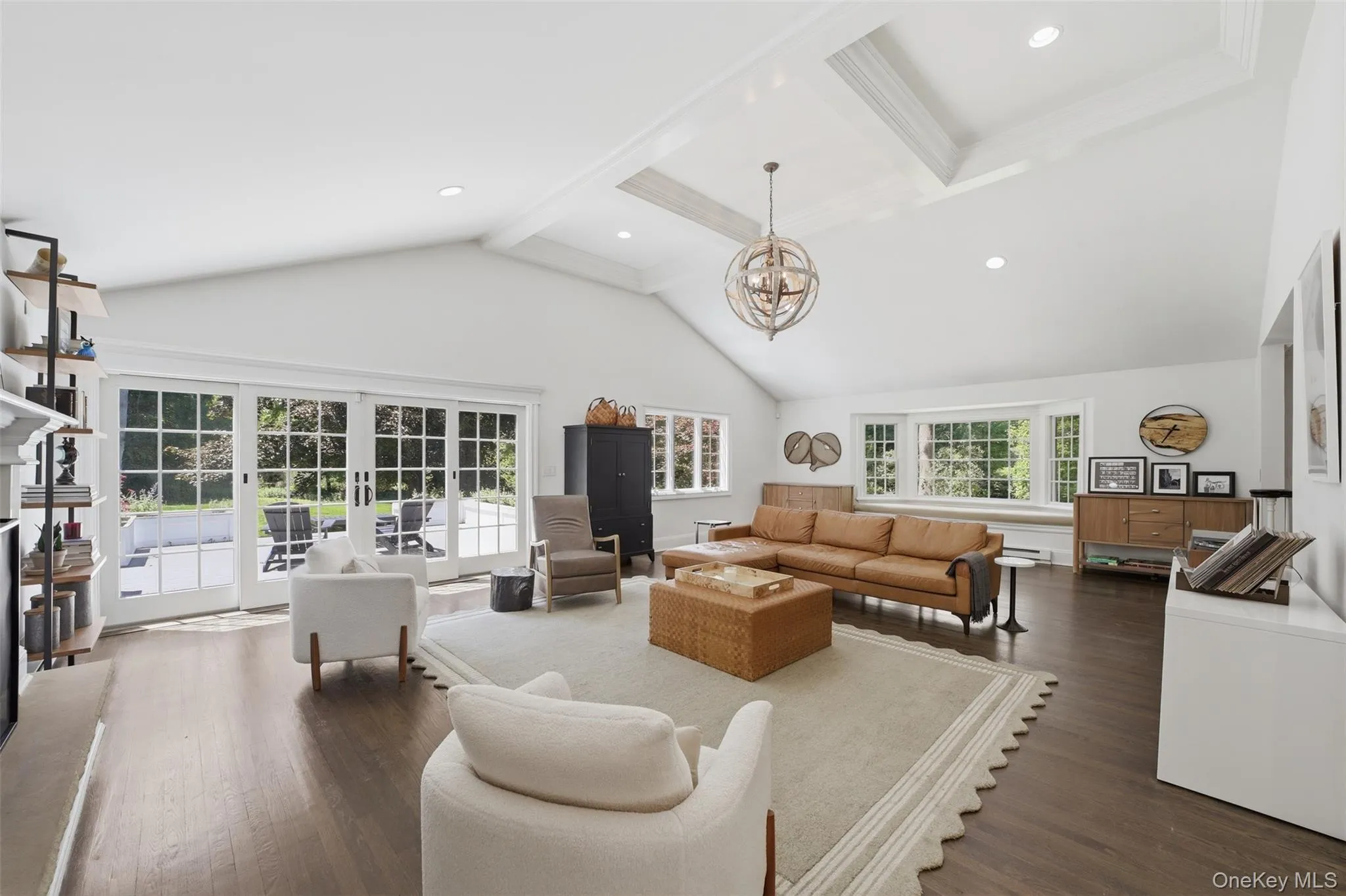 Soaring ceilings, fireplace, coffered ceiling, doors to sensational deck where nature surrounds you Soaring ceilings, fireplace, coffered ceiling, doors to sensational deck where nature surrounds you