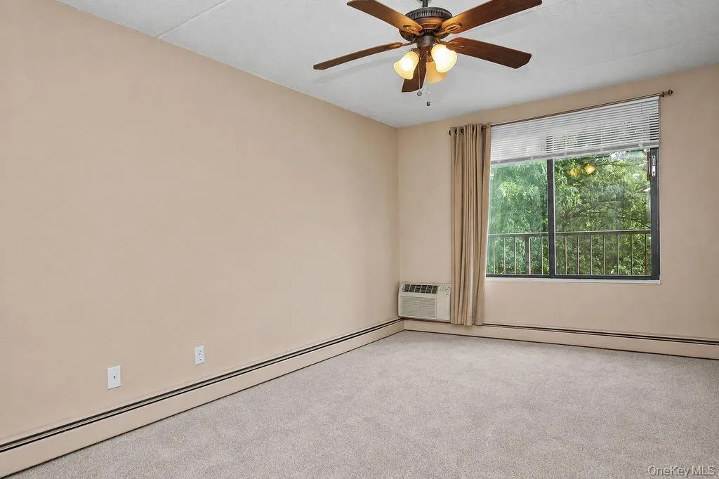 A sensational bedroom with brand new carpeting, a delightful ceiling fan for supreme air circulation. Great nature views A sensational bedroom with brand new carpeting, a delightful ceiling fan for supreme air circulation. Great nature views
