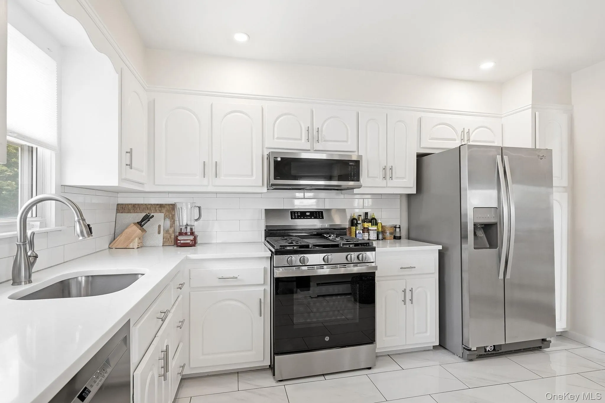 Renovated Kitchen with Stainless Appliances Renovated Kitchen with Stainless Appliances