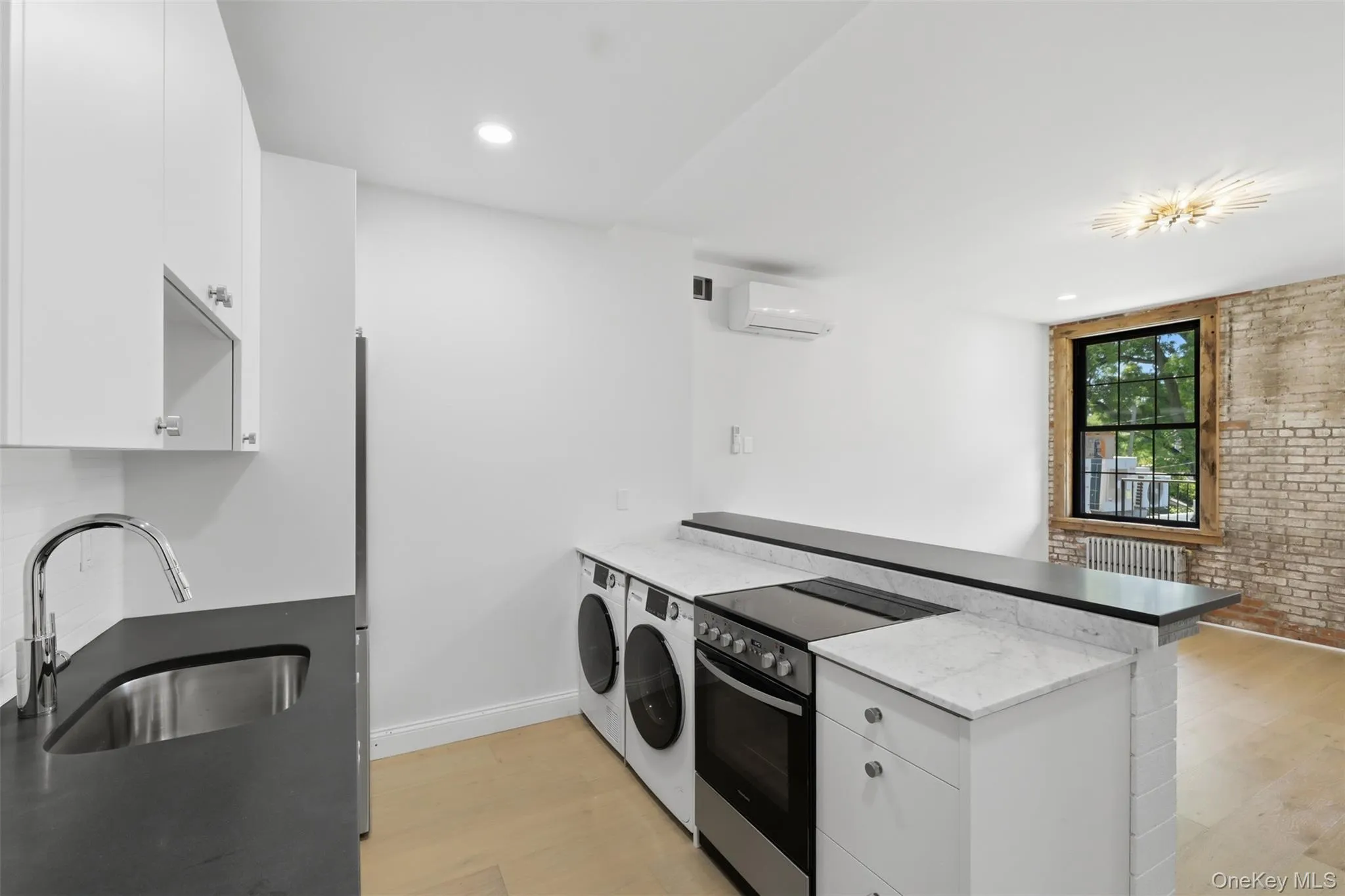 Brand New Kitchen with State of the Art Appliances, Island with Seating overlooks Oversized Living Room with access to HUGE DECK Brand New Kitchen with State of the Art Appliances, Island with Seating overlooks Oversized Living Room with access to HUGE DECK