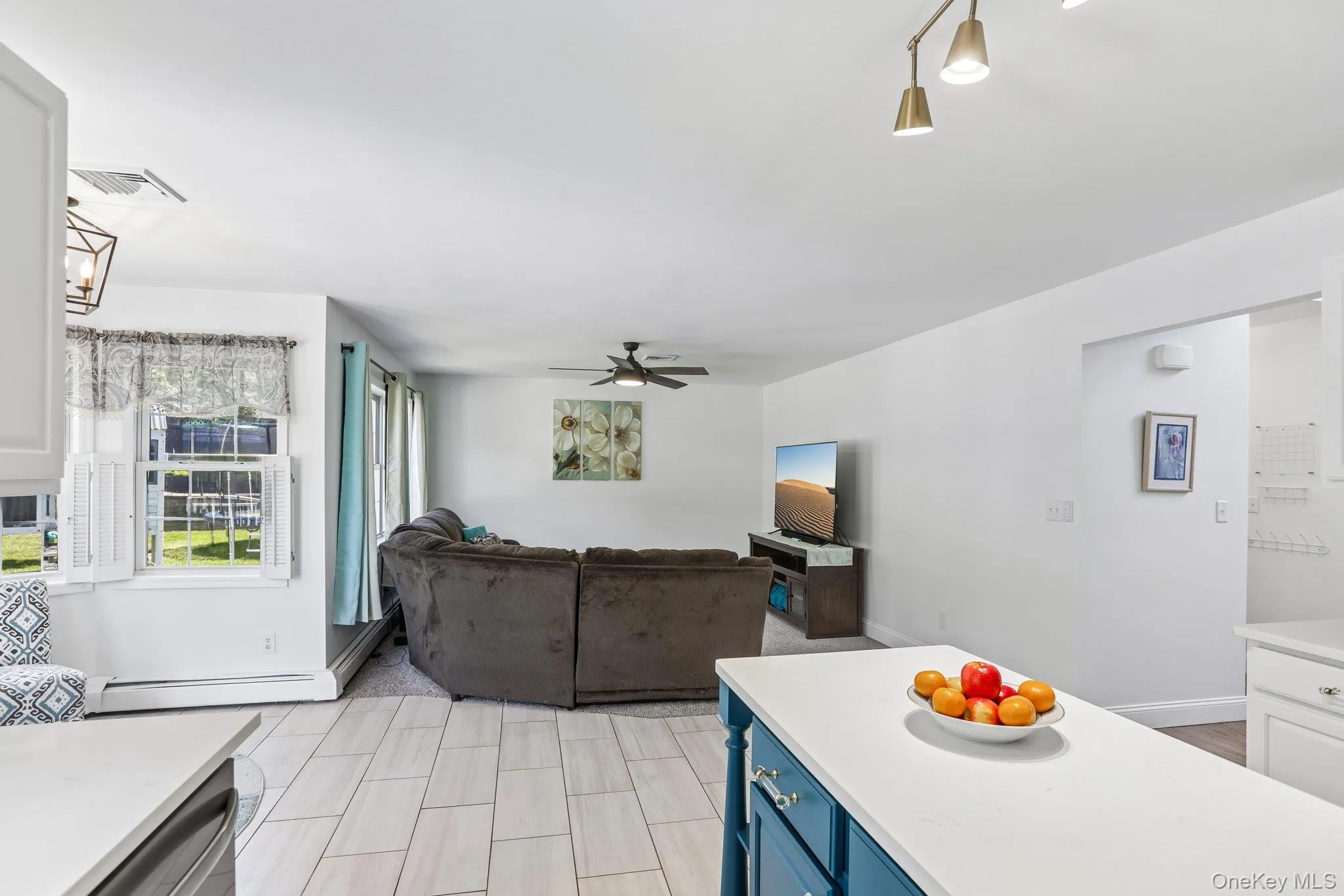 Family room is just off the kitchen perfect for entertaining. Family room is just off the kitchen perfect for entertaining.