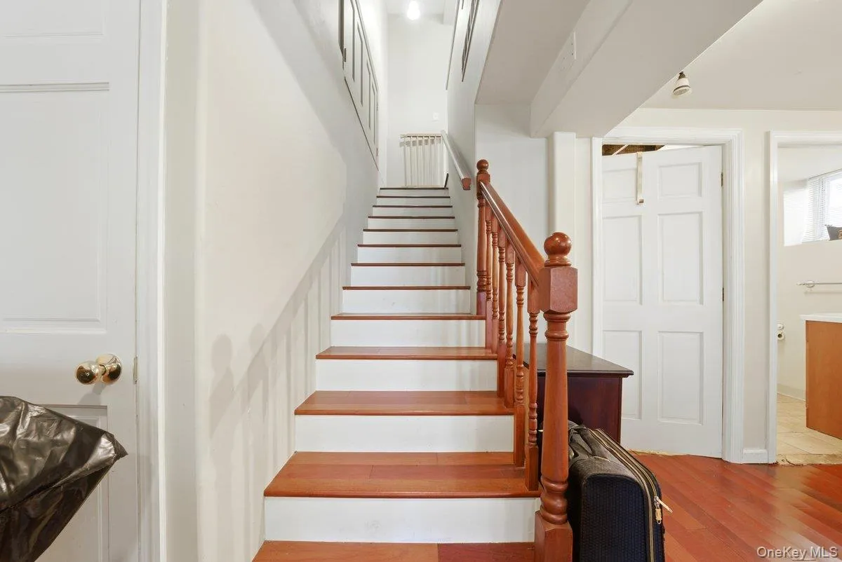 Stairs from the First Floor to the Basement Stairs from the First Floor to the Basement