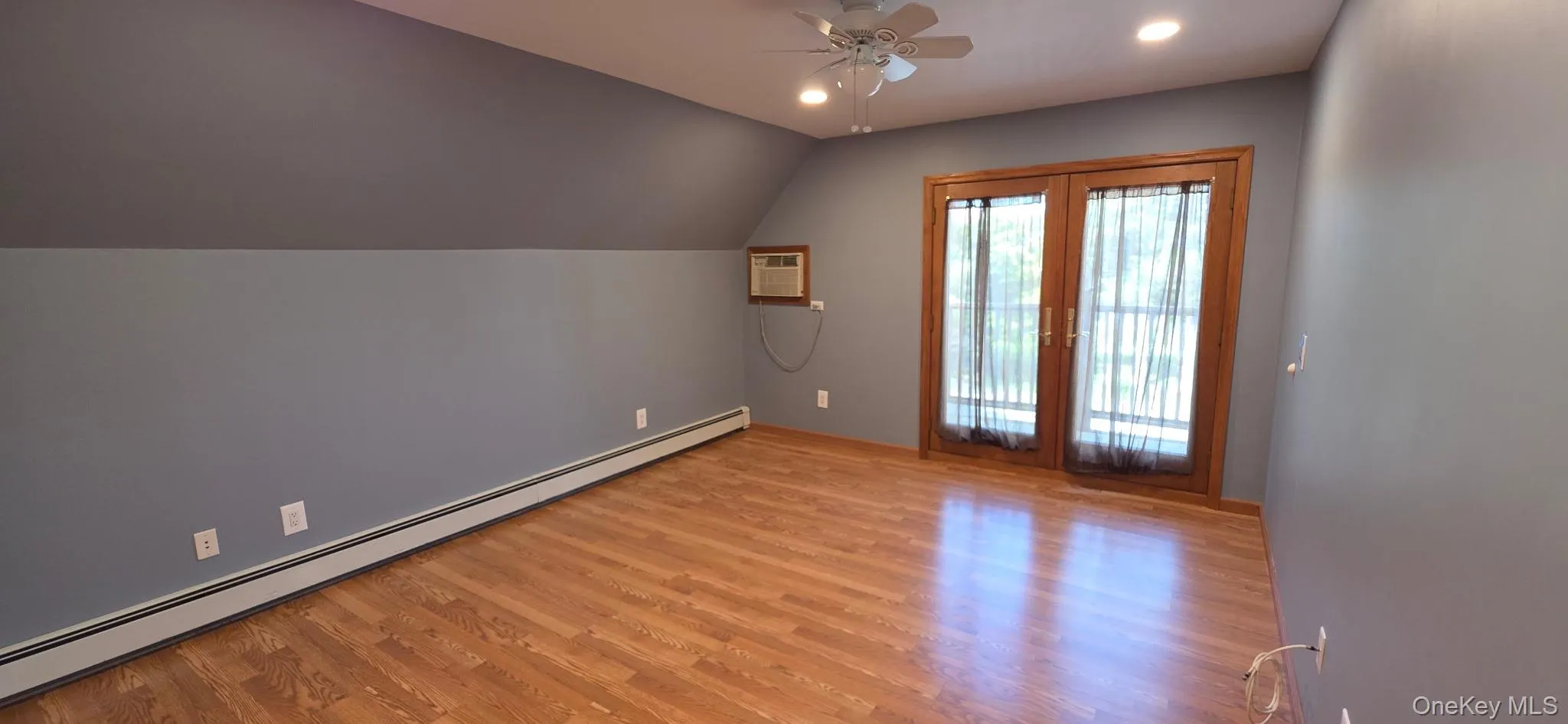 Upstairs Bedroom includes a balcony Upstairs Bedroom includes a balcony