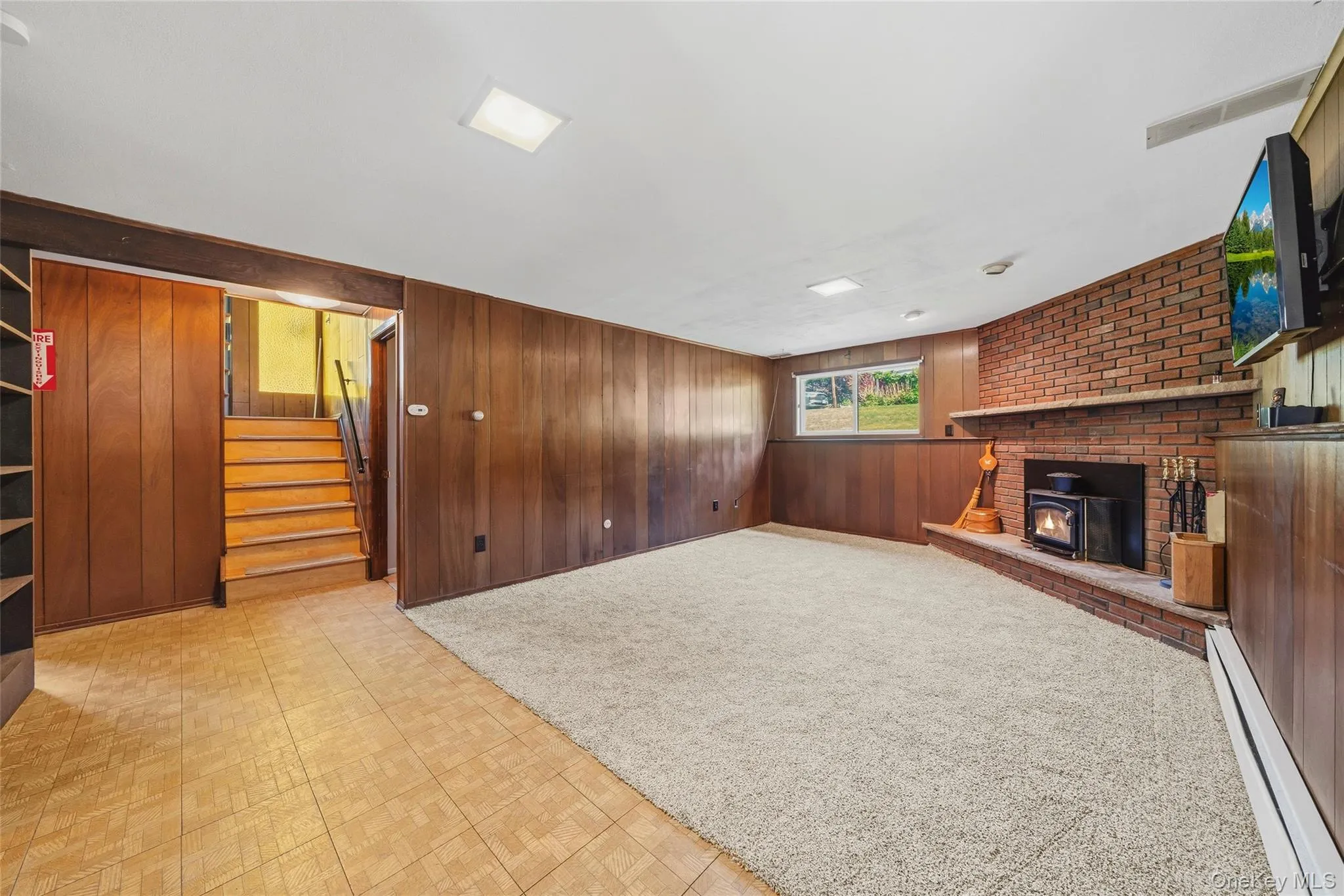 Lower Level Family Room with a Fireplace Lower Level Family Room with a Fireplace