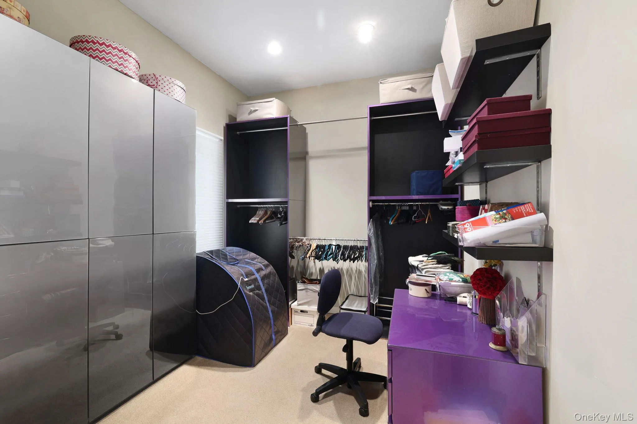 Closet space located behind the primary bathroom Closet space located behind the primary bathroom