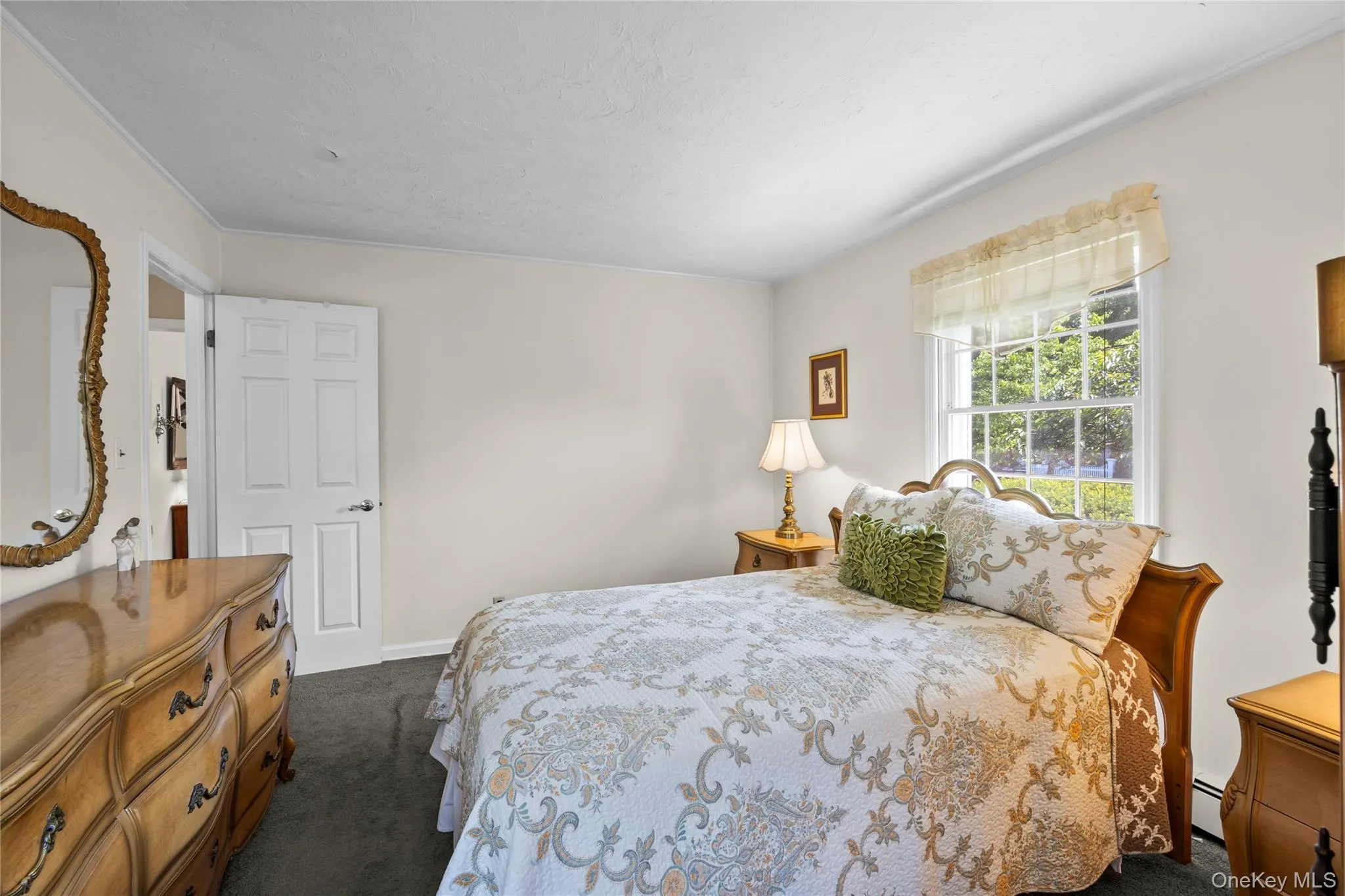Main Floor Primary Bedroom across from full bath Main Floor Primary Bedroom across from full bath
