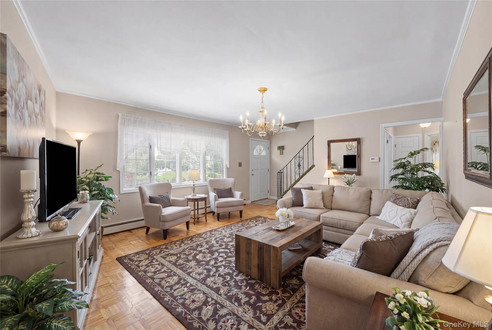 This room is staged as a living room. Currently, it is the dining room but could easily be repurposed. according to preference. This room is staged as a living room. Currently, it is the dining room but could easily be repurposed. according to preference.