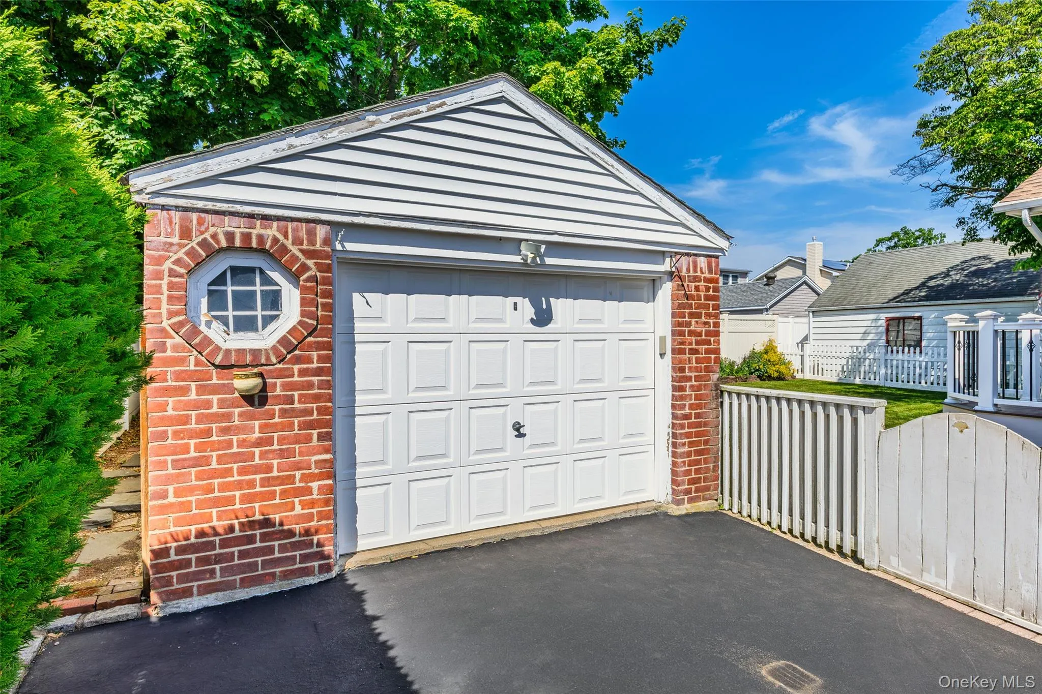 One car detached garage w/additional storage area at the rear. One car detached garage w/additional storage area at the rear.