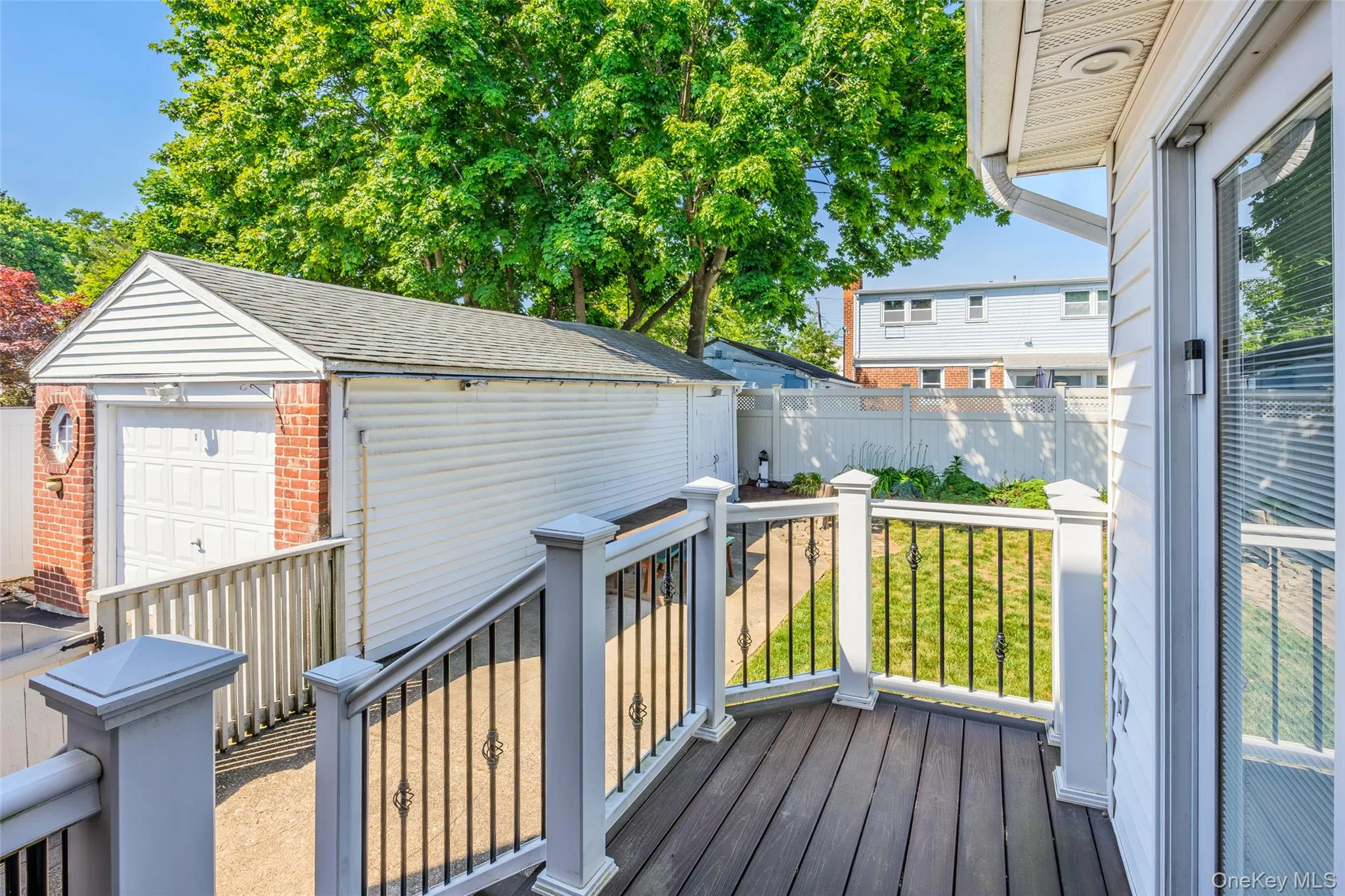 Deck w/Trex Decking to yard and driveway Deck w/Trex Decking to yard and driveway