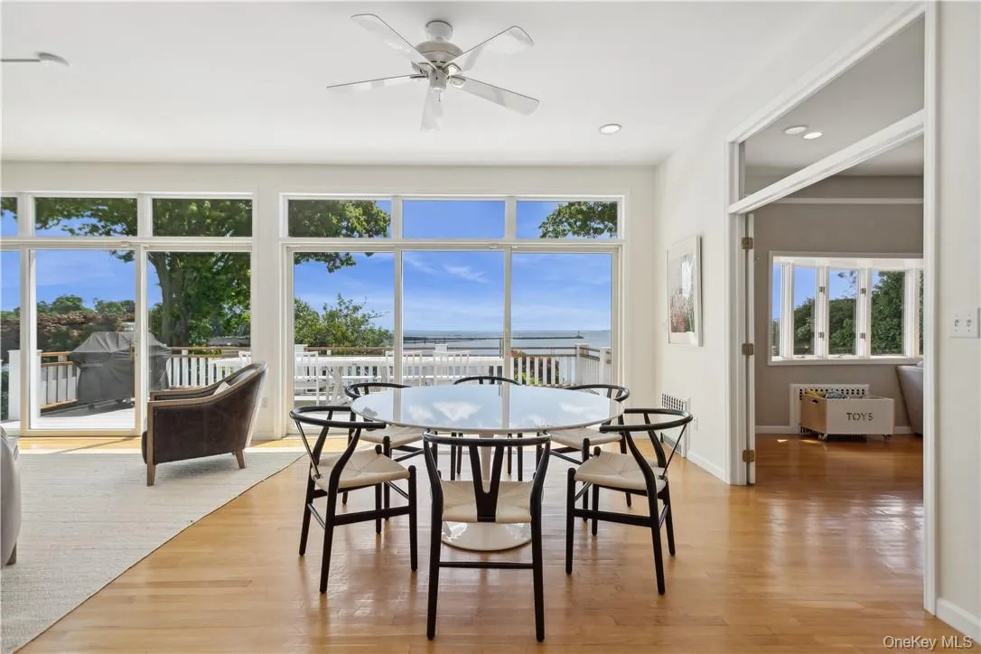 Dining Area open to Living Room with water views Dining Area open to Living Room with water views