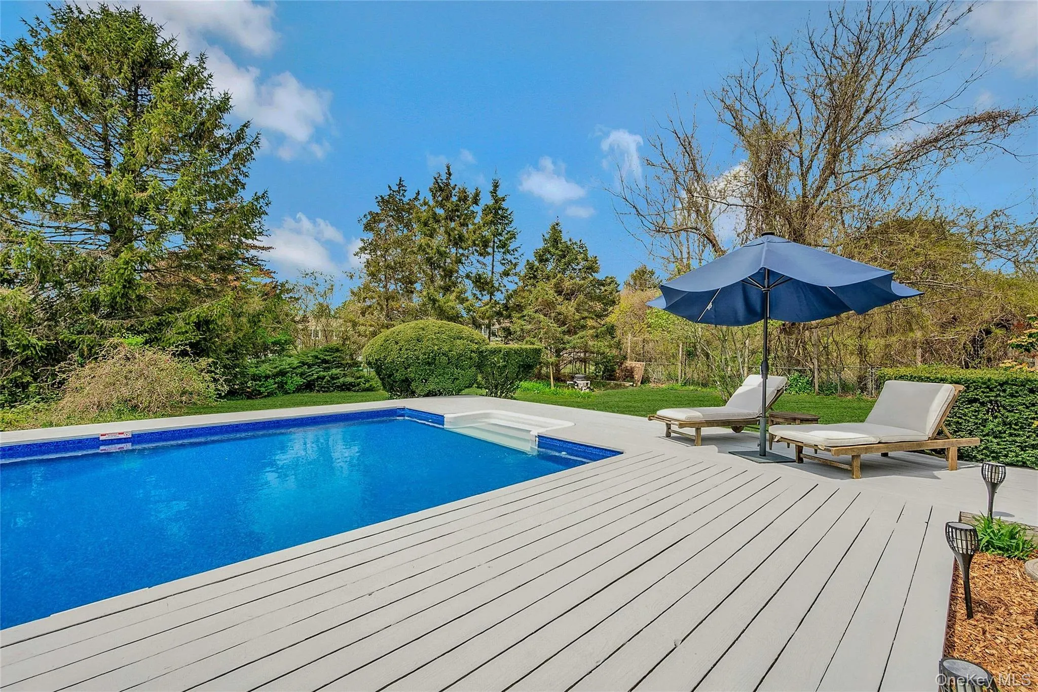 Outdoor pool with a deck Outdoor pool with a deck