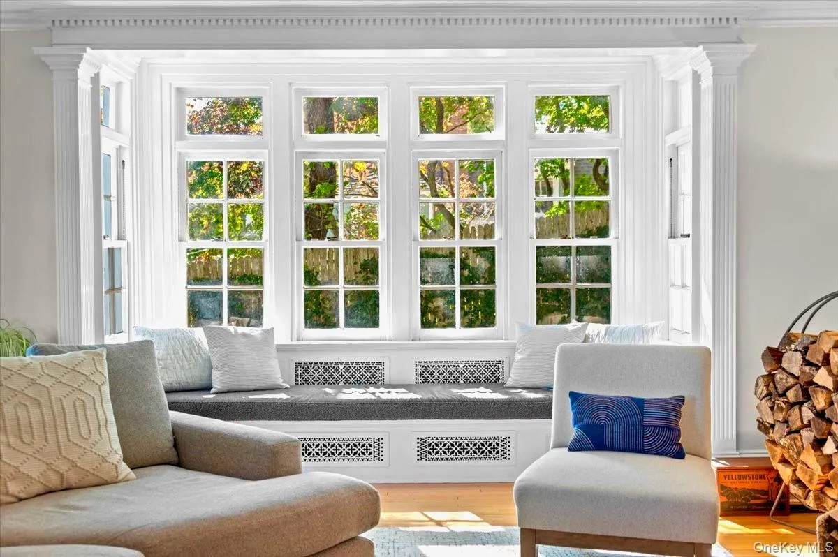 Sunroom featuring radiator heating unit Sunroom featuring radiator heating unit