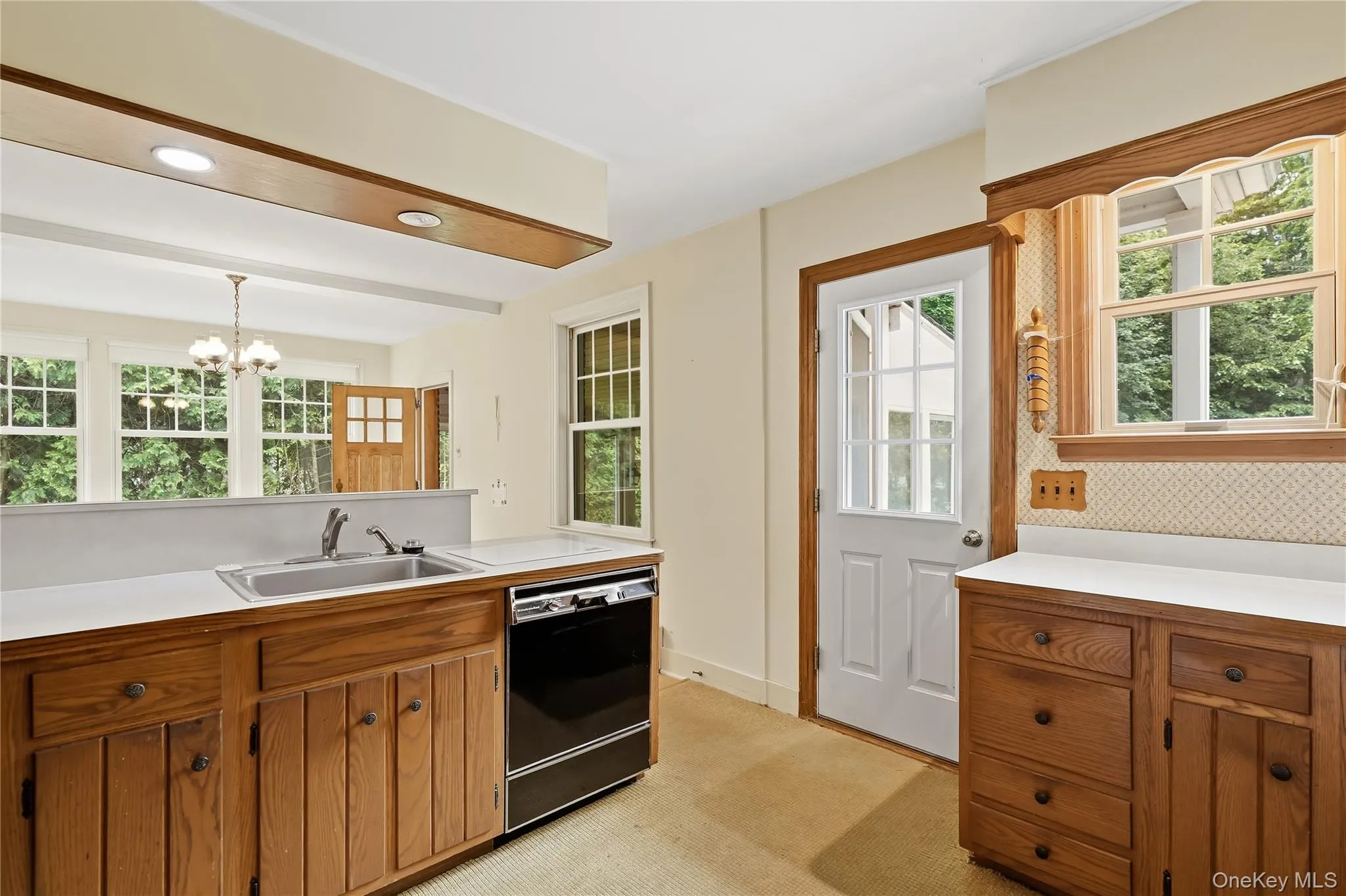 Convenient rear door access from driveway Convenient rear door access from driveway