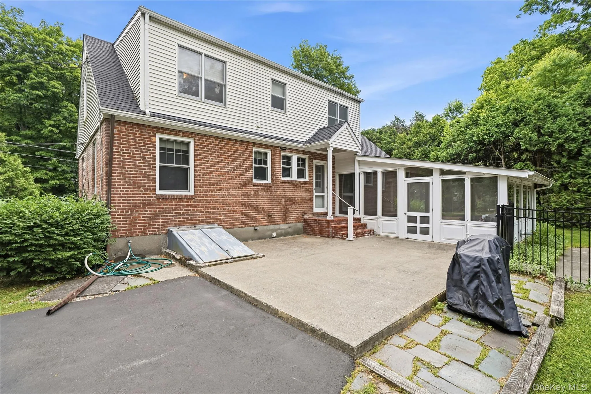 Convenient rear entry to home and screened porch Convenient rear entry to home and screened porch