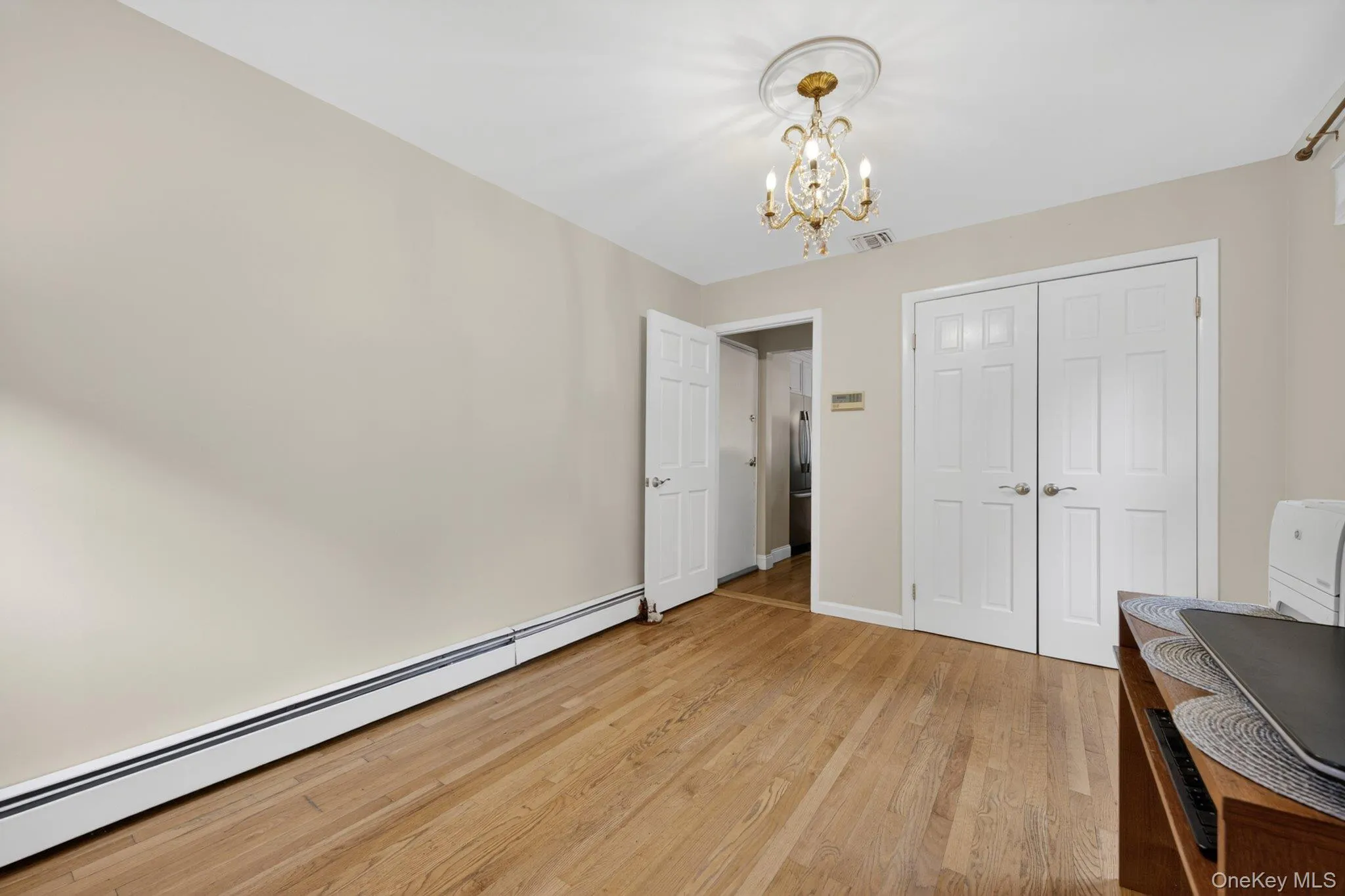 Office with convenient laundry in closet. Office with convenient laundry in closet.