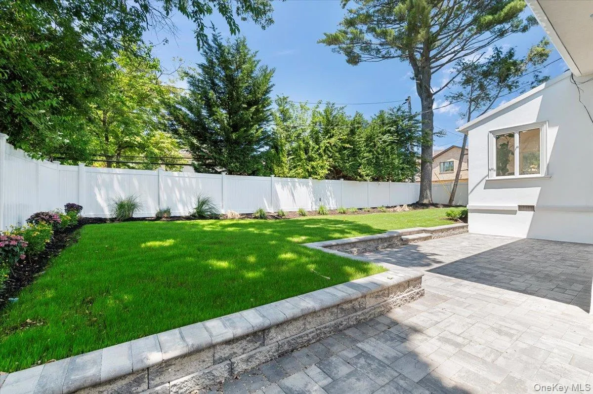 Fenced backyard with a patio Fenced backyard with a patio